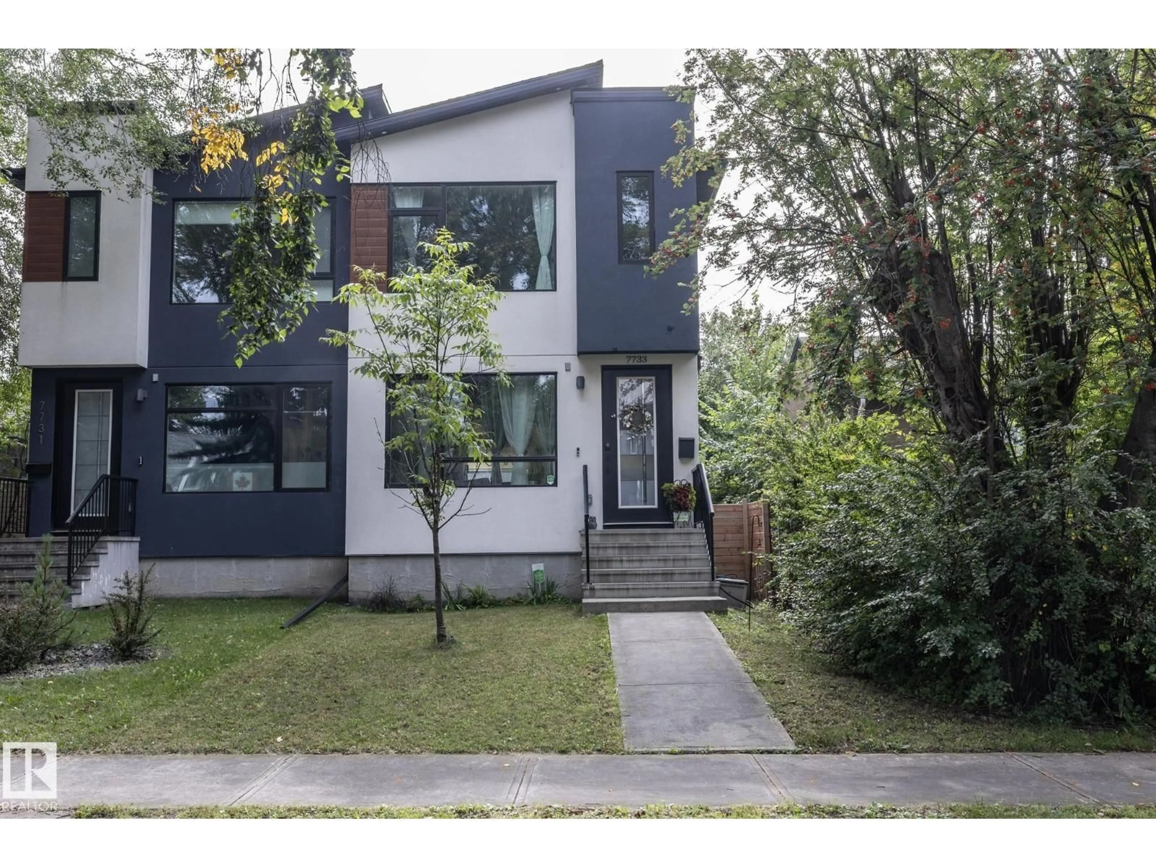 Home with brick exterior material, street for 7733 81 AV, Edmonton Alberta T6C0V4