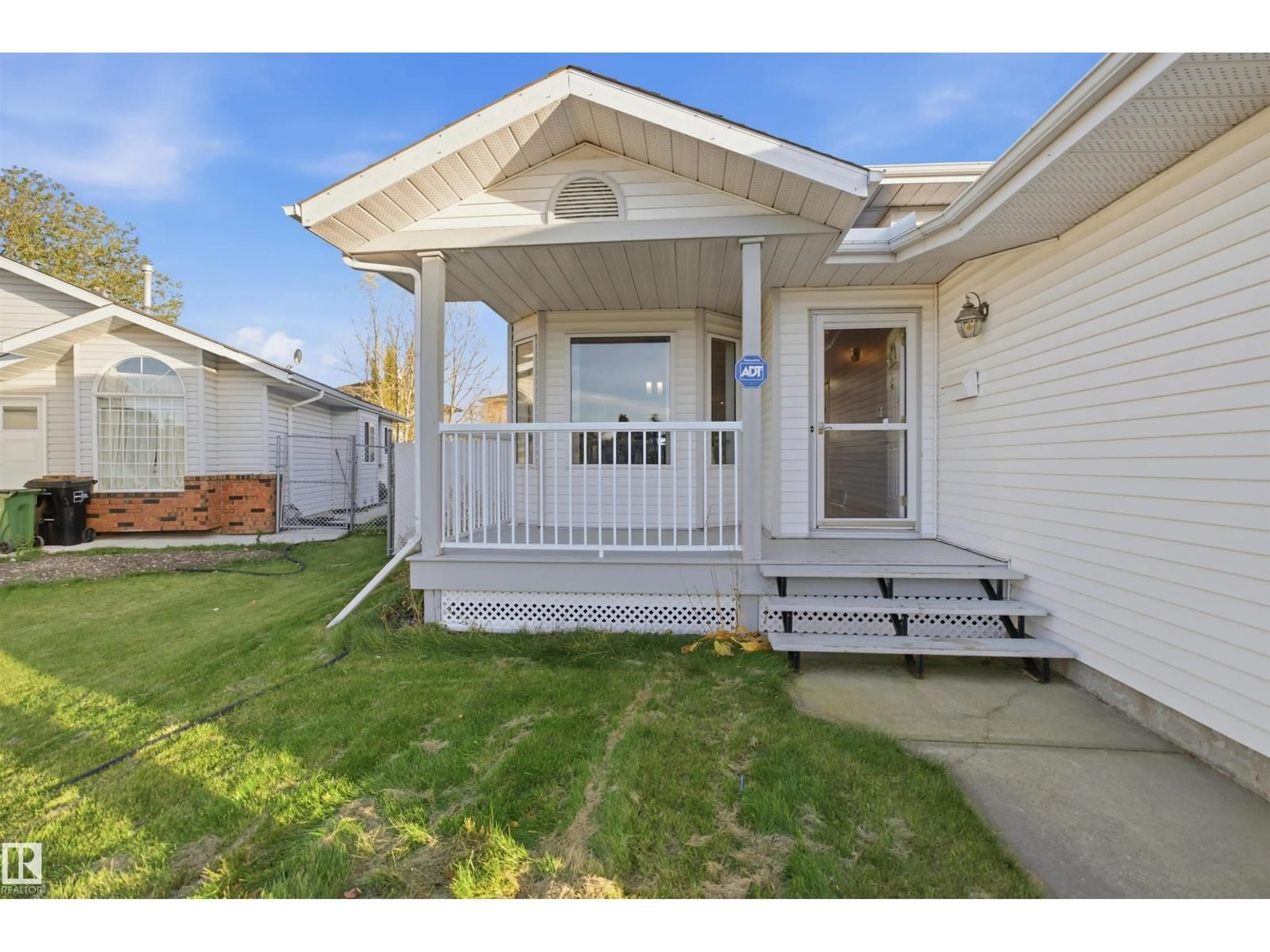 Home with vinyl exterior material, street for NW - 17007 90A ST, Edmonton Alberta T5Z2Y9