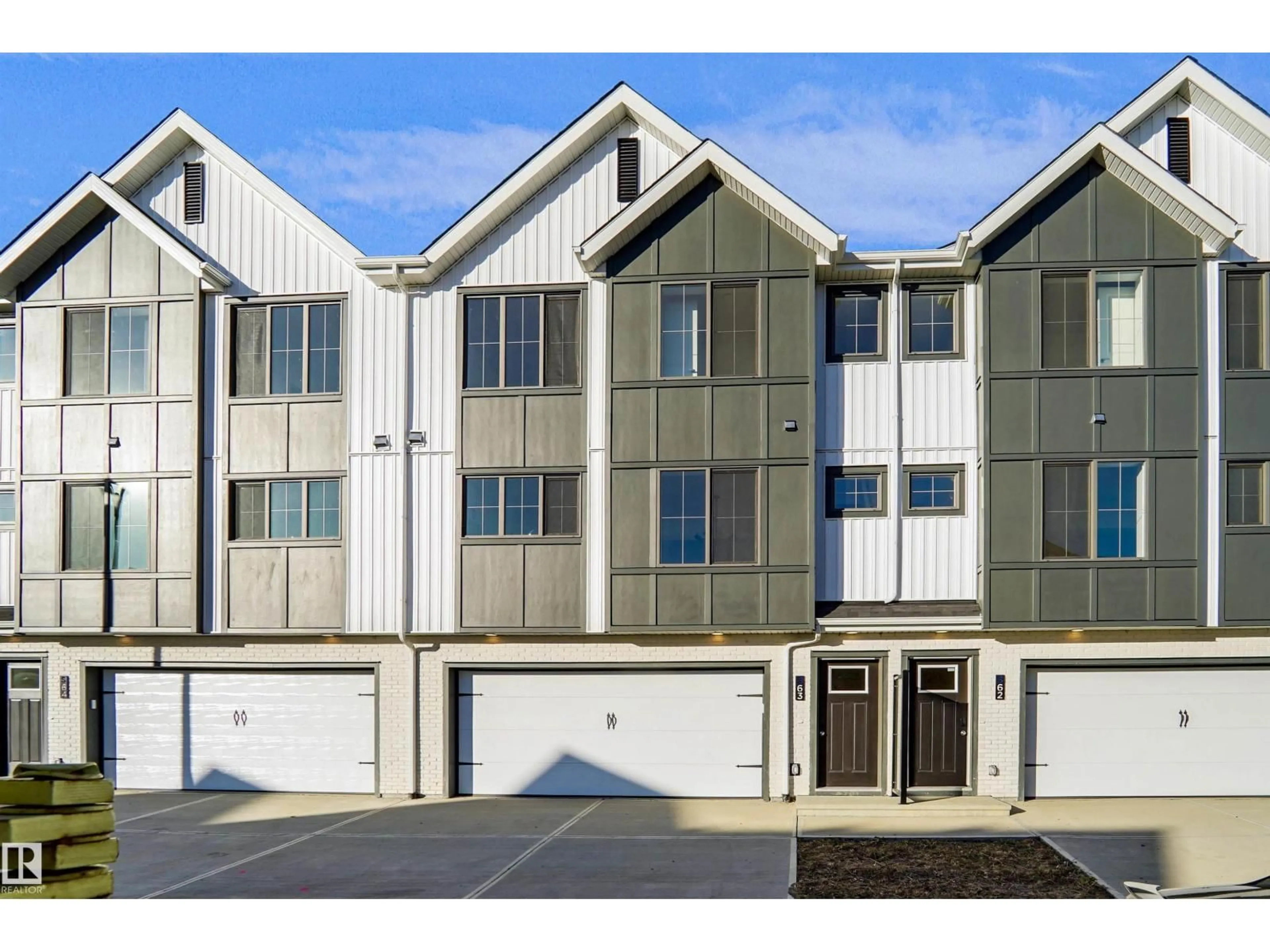 Home with vinyl exterior material, street for 63 17319 5 ST NE, Edmonton Alberta T5Y4G1
