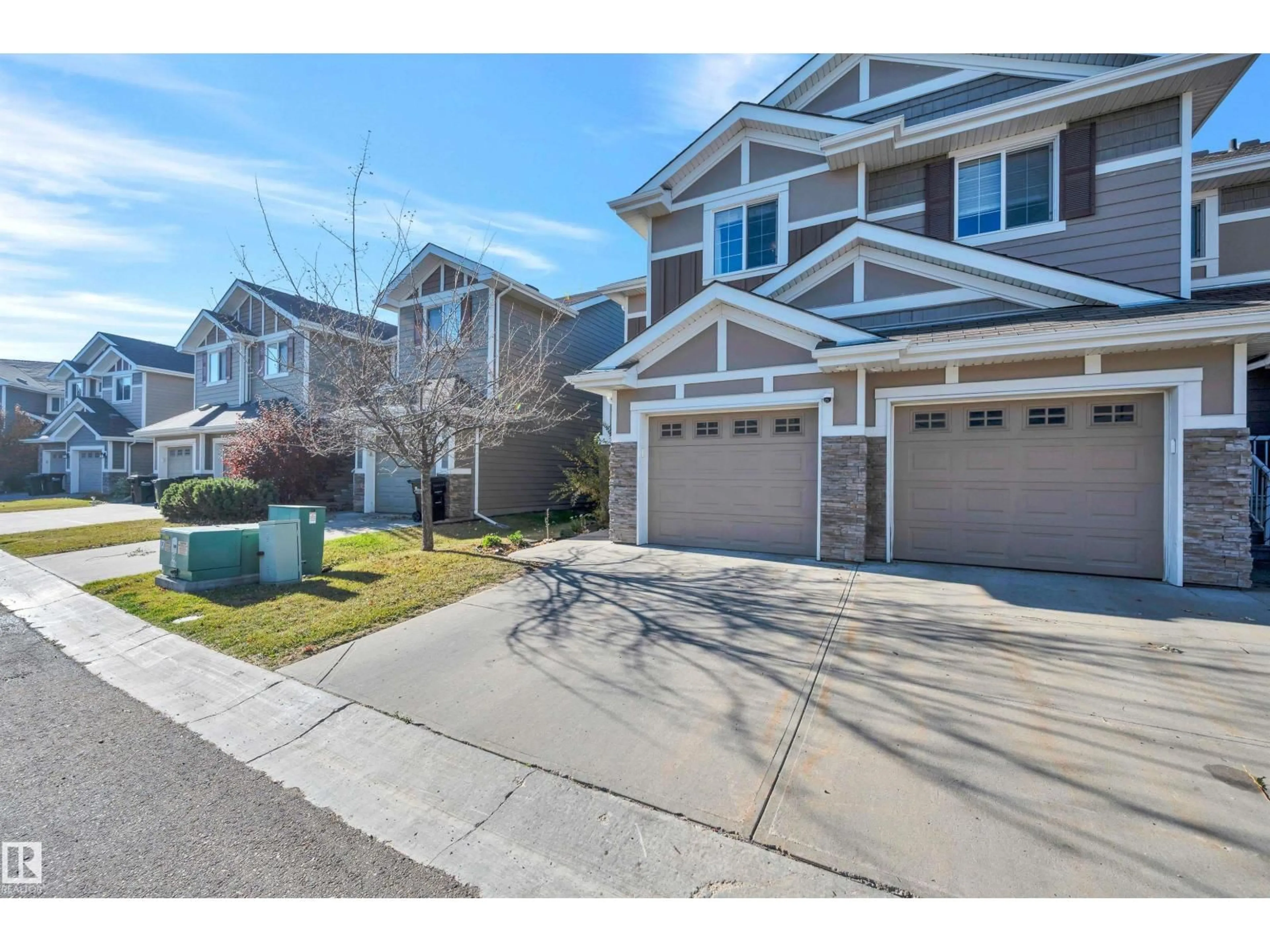 A pic from outside/outdoor area/front of a property/back of a property/a pic from drone, street for #91 - 219 CHARLOTTE WY, Sherwood Park Alberta T8H0T3