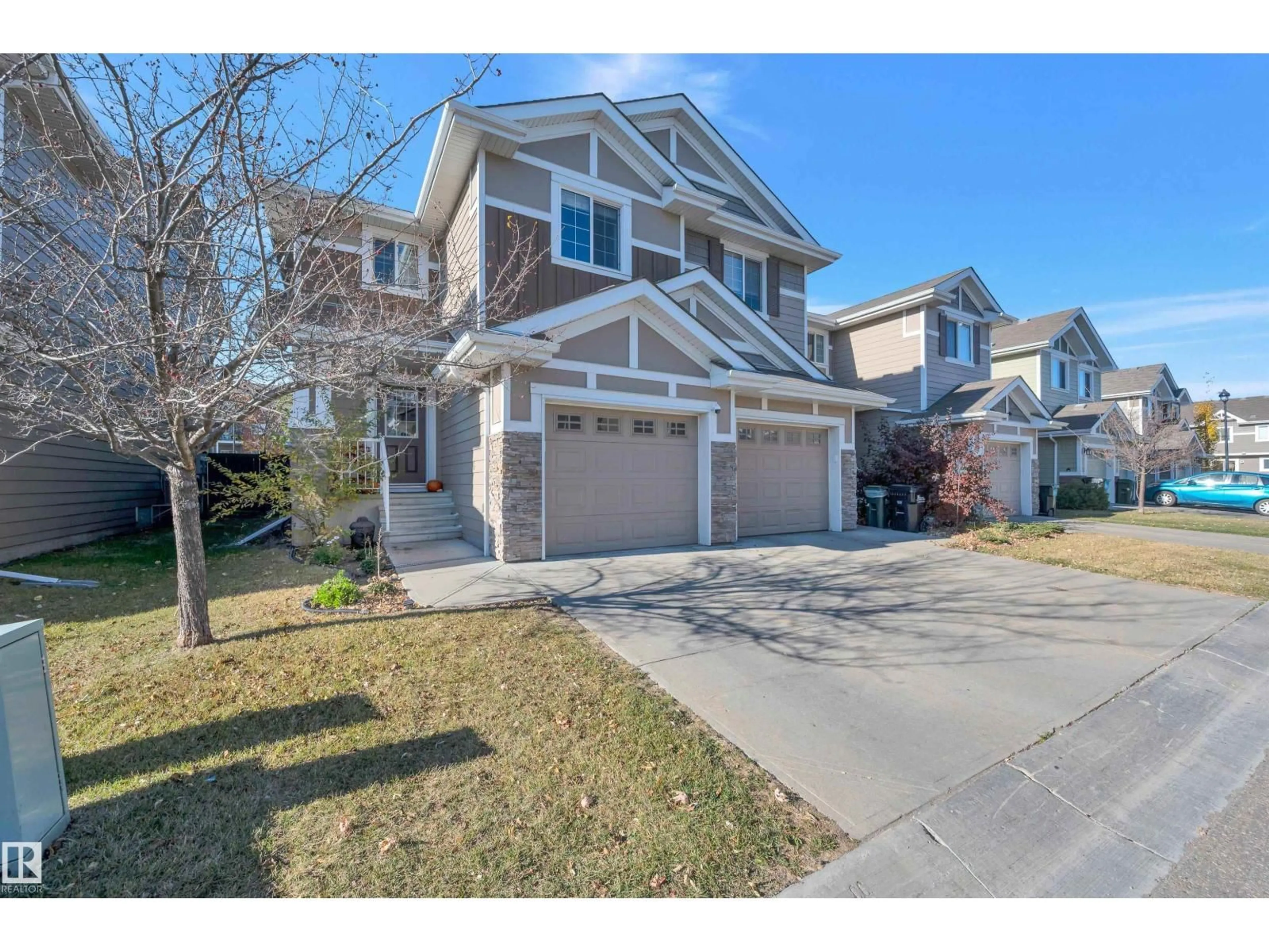 A pic from outside/outdoor area/front of a property/back of a property/a pic from drone, street for #91 - 219 CHARLOTTE WY, Sherwood Park Alberta T8H0T3