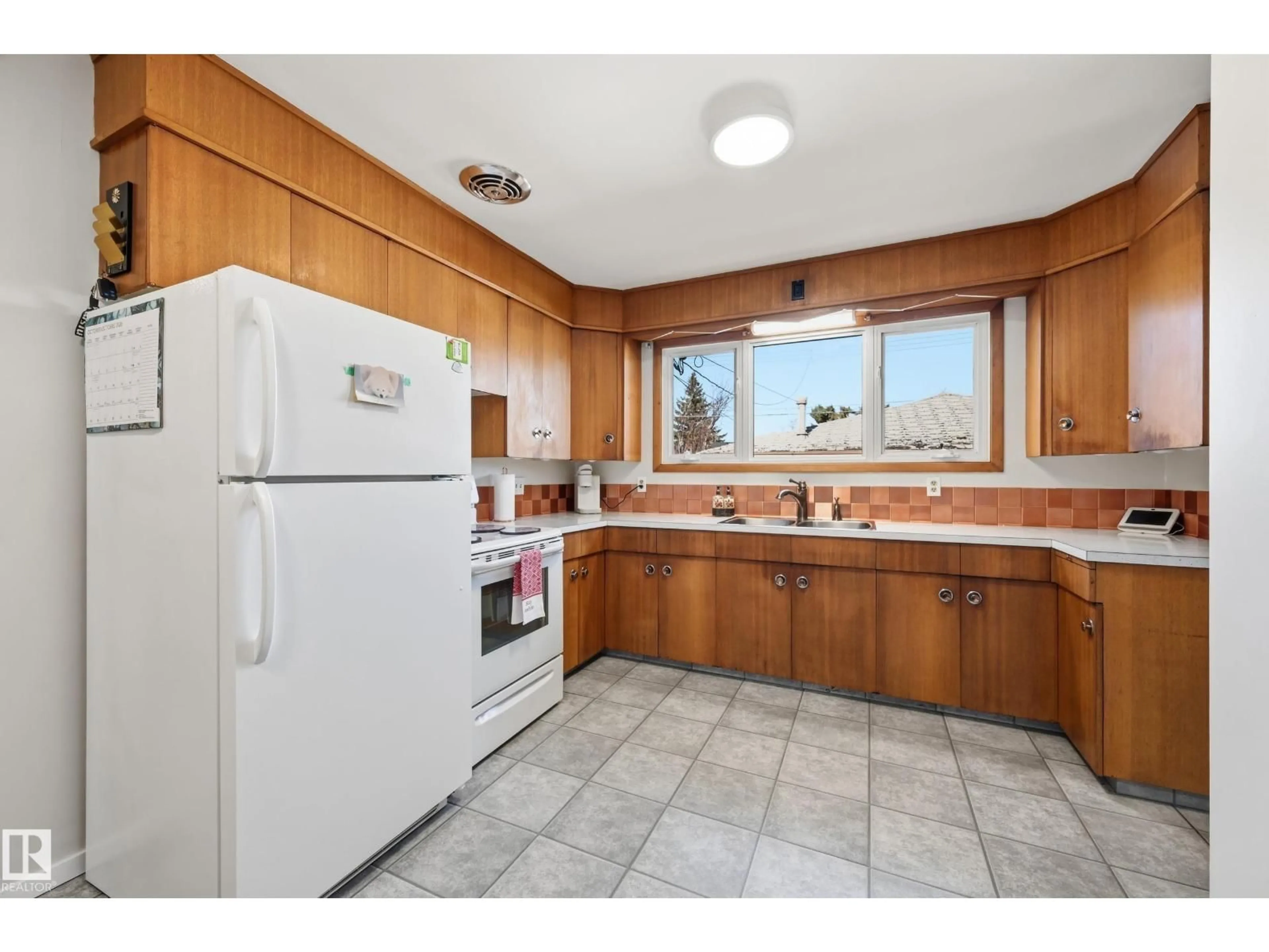 Standard kitchen, ceramic/tile floor for 6604 93 AV, Edmonton Alberta T6B0W5