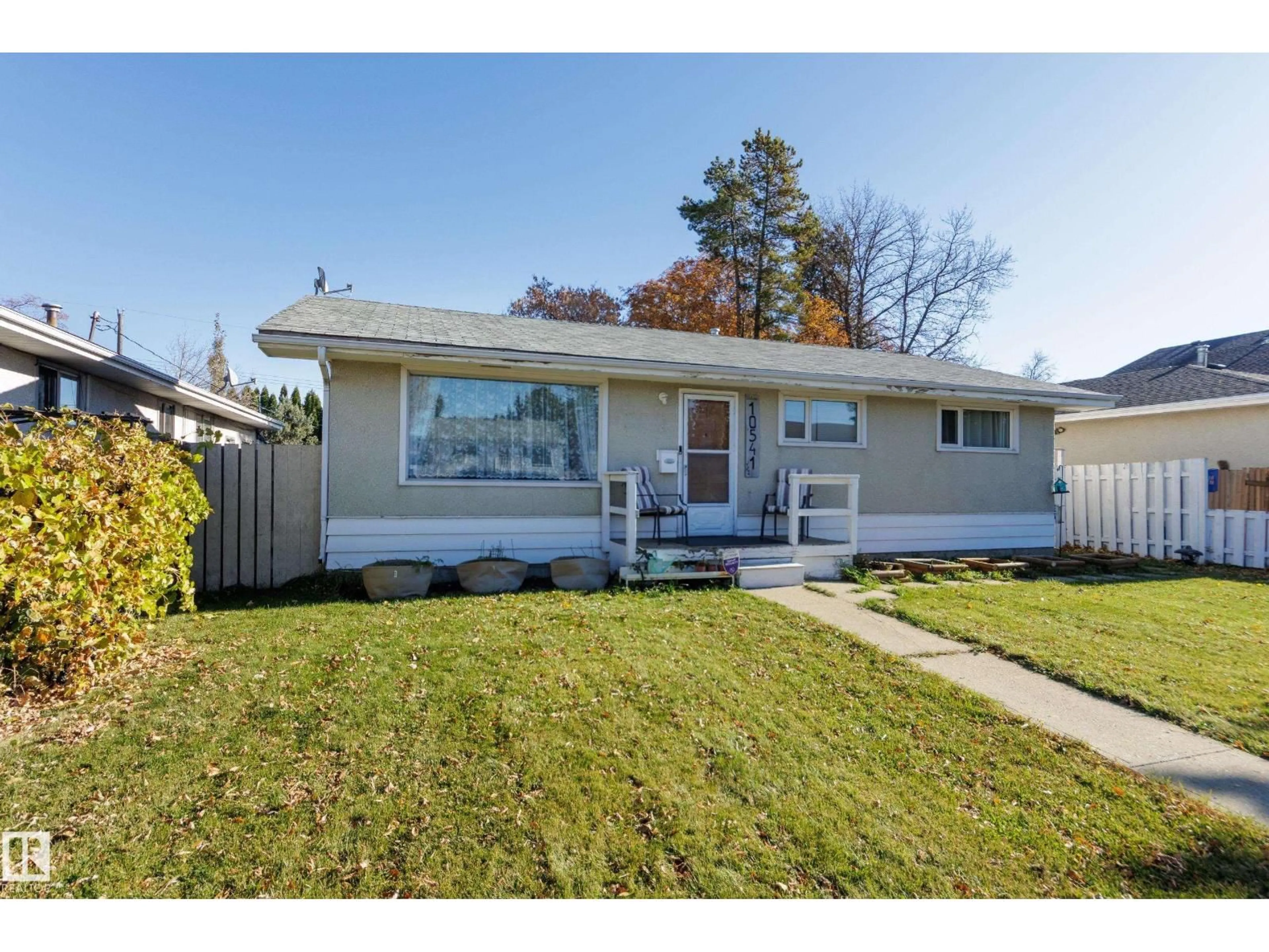 Home with vinyl exterior material, street for NW - 10541 153 ST, Edmonton Alberta T5P2C2
