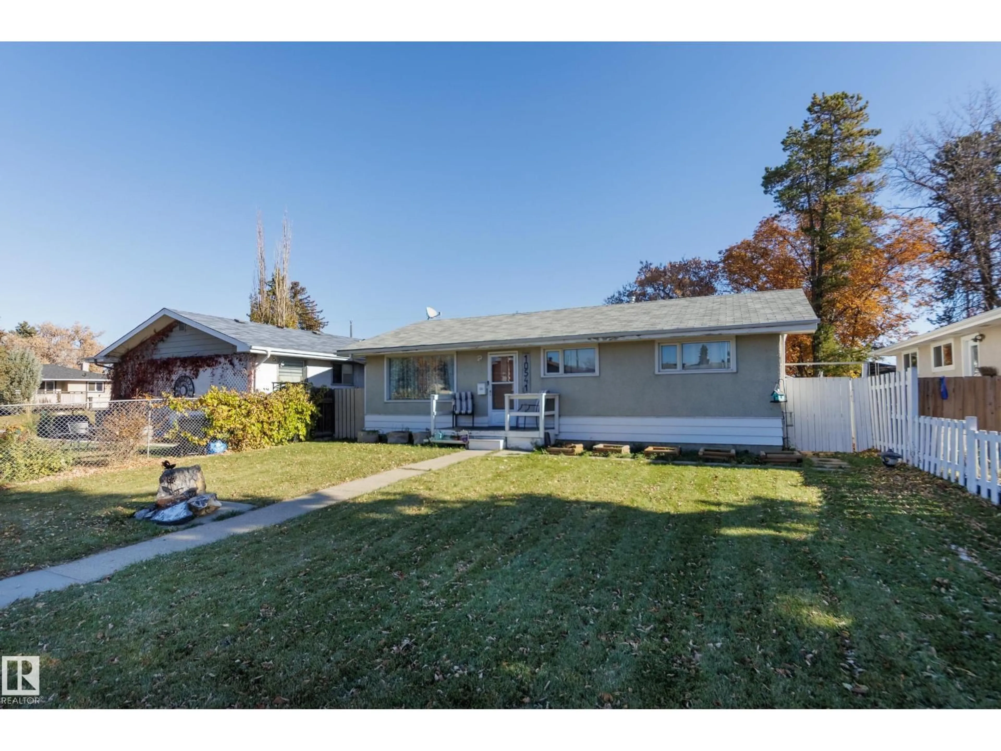 Home with vinyl exterior material, street for NW - 10541 153 ST, Edmonton Alberta T5P2C2