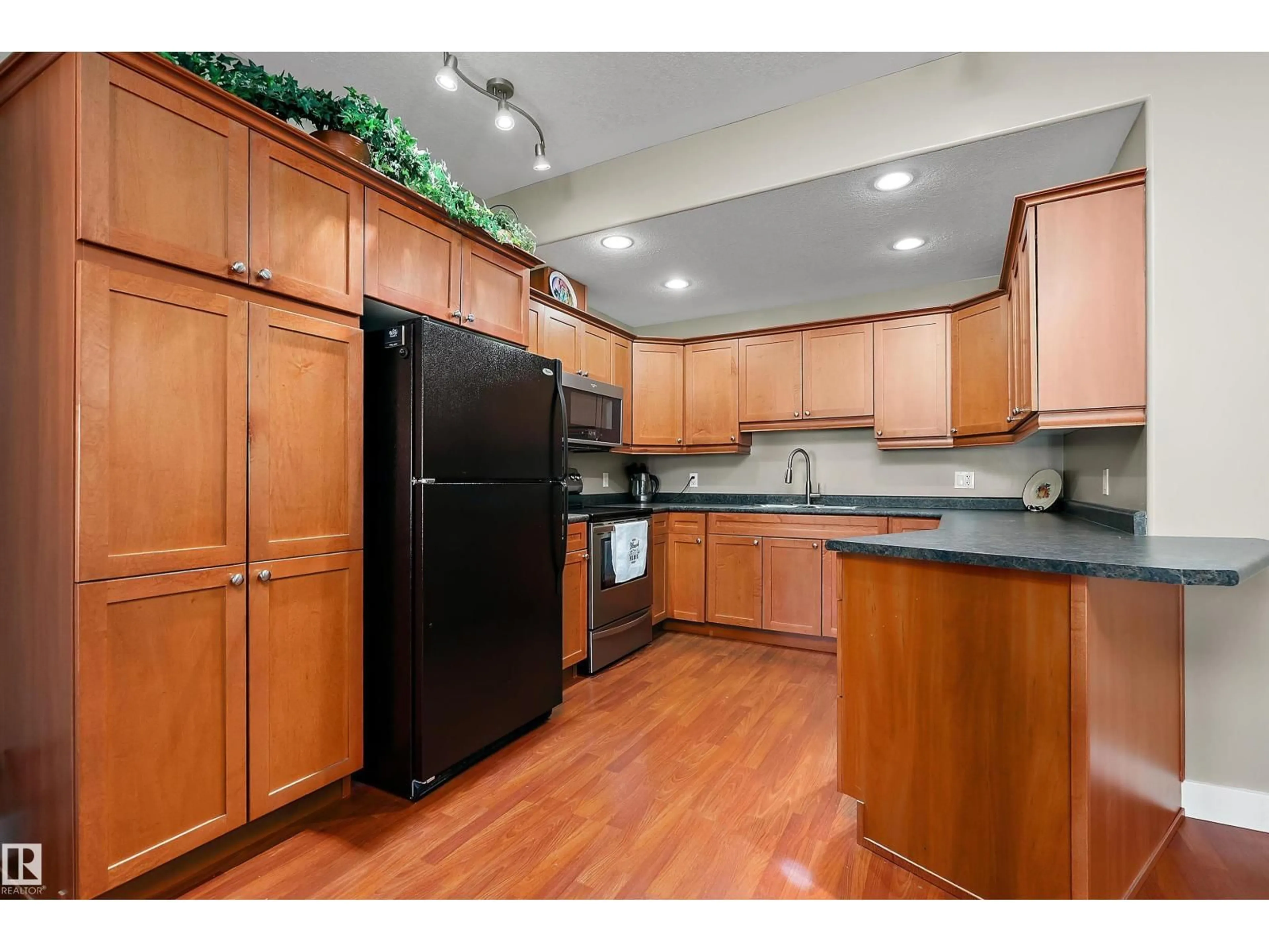 Standard kitchen, wood/laminate floor for #303 - 5401 37A AV, Wetaskiwin Alberta T9A1H9