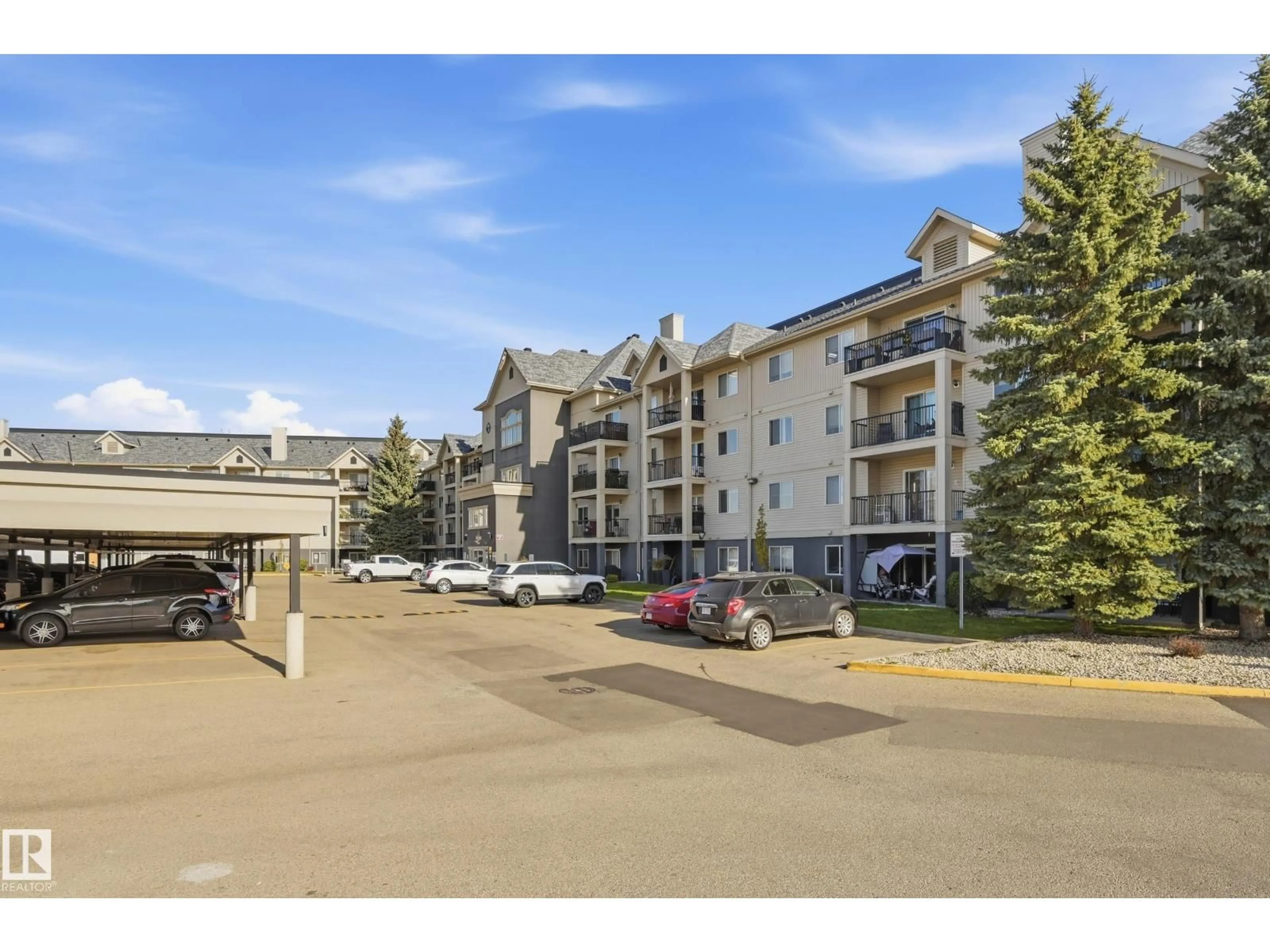 A pic from outside/outdoor area/front of a property/back of a property/a pic from drone, mountain view for #302 - 592 HOOKE RD, Edmonton Alberta T5A5H2
