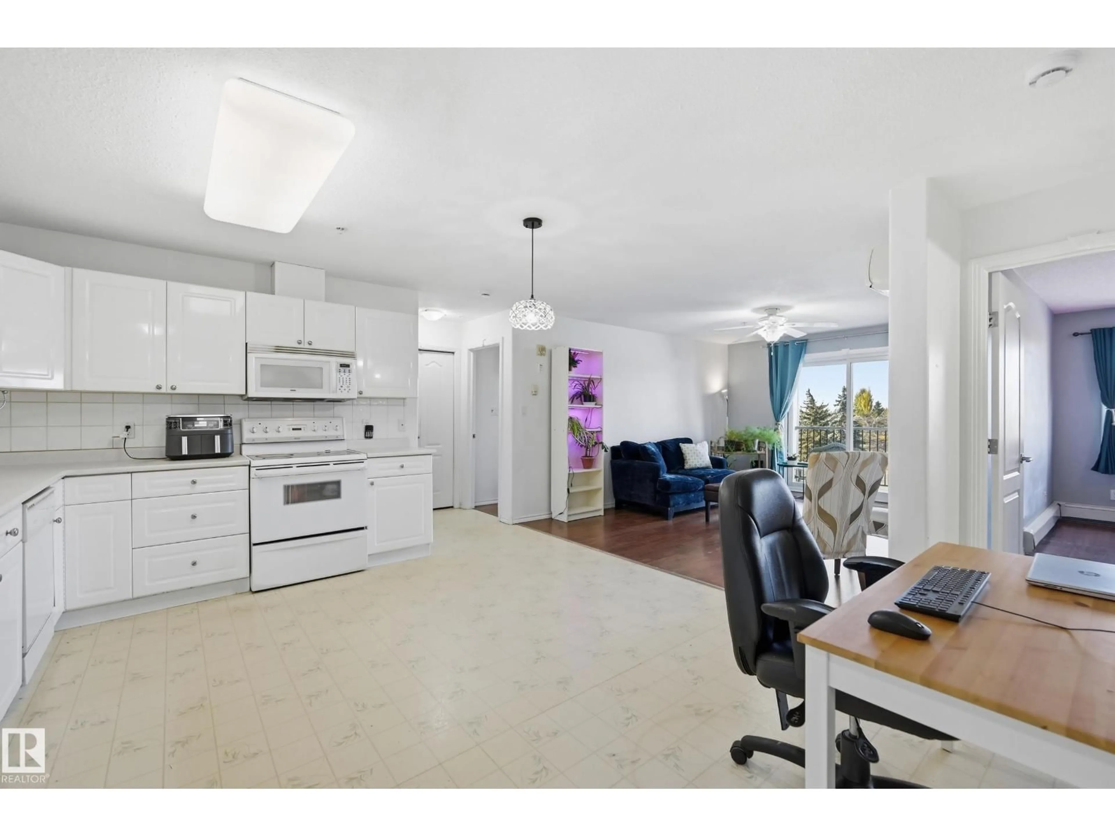 Open concept kitchen, ceramic/tile floor for #302 - 592 HOOKE RD, Edmonton Alberta T5A5H2