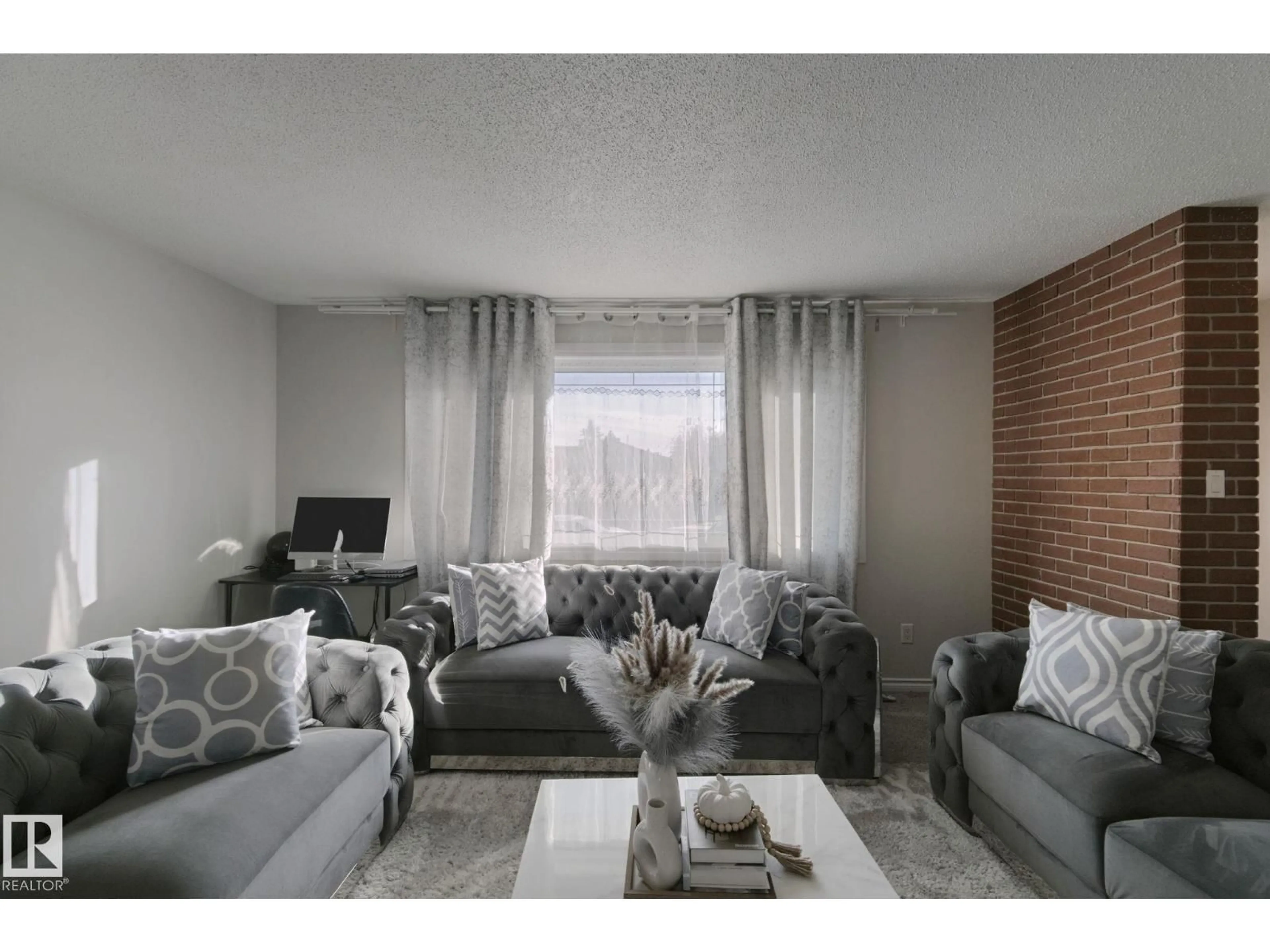 Living room with furniture, unknown for 7332 149A AV, Edmonton Alberta T5C2W4