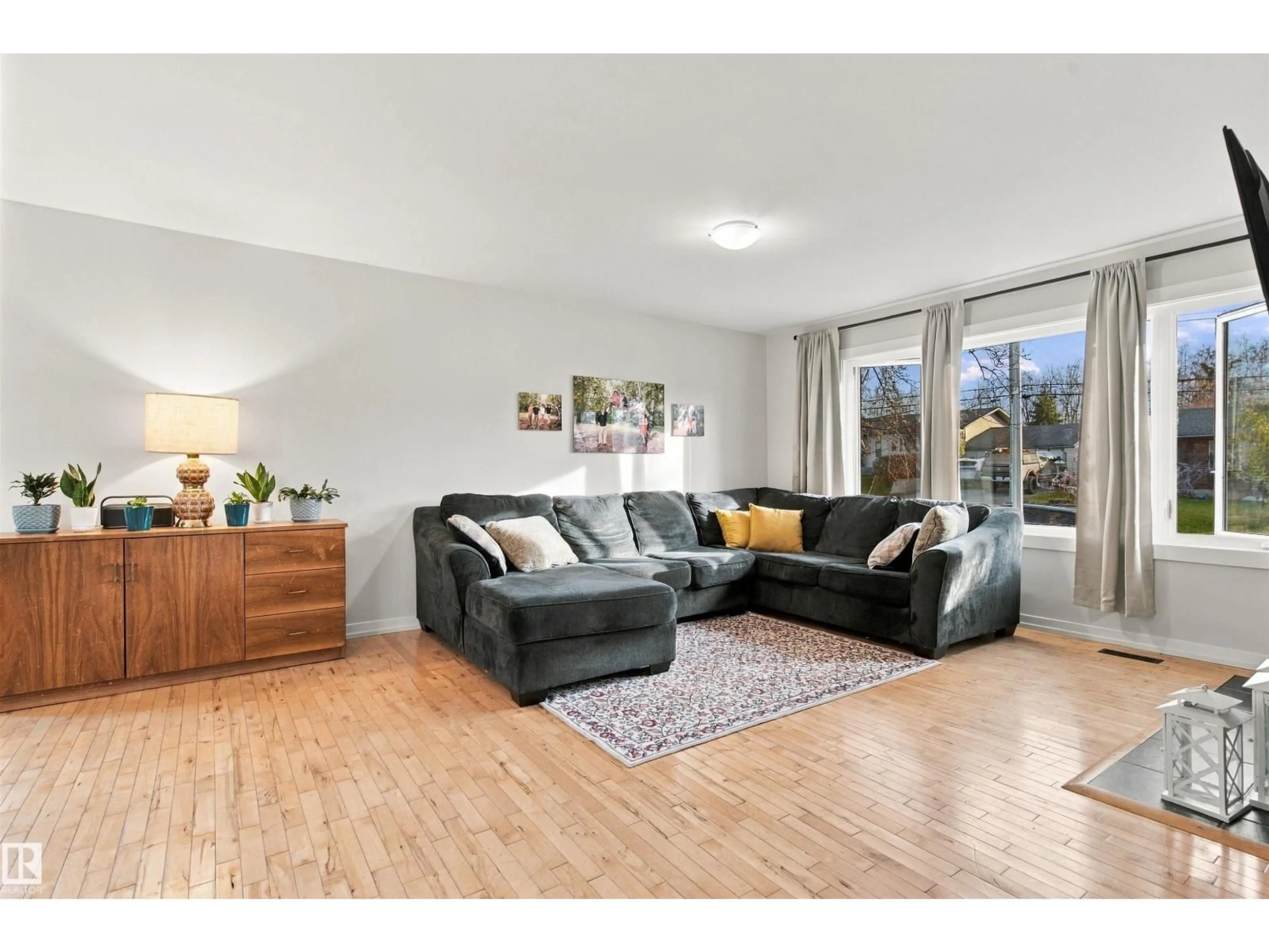 Living room with furniture, wood/laminate floor for 5708 47 AV, Cold Lake Alberta T9M1T9