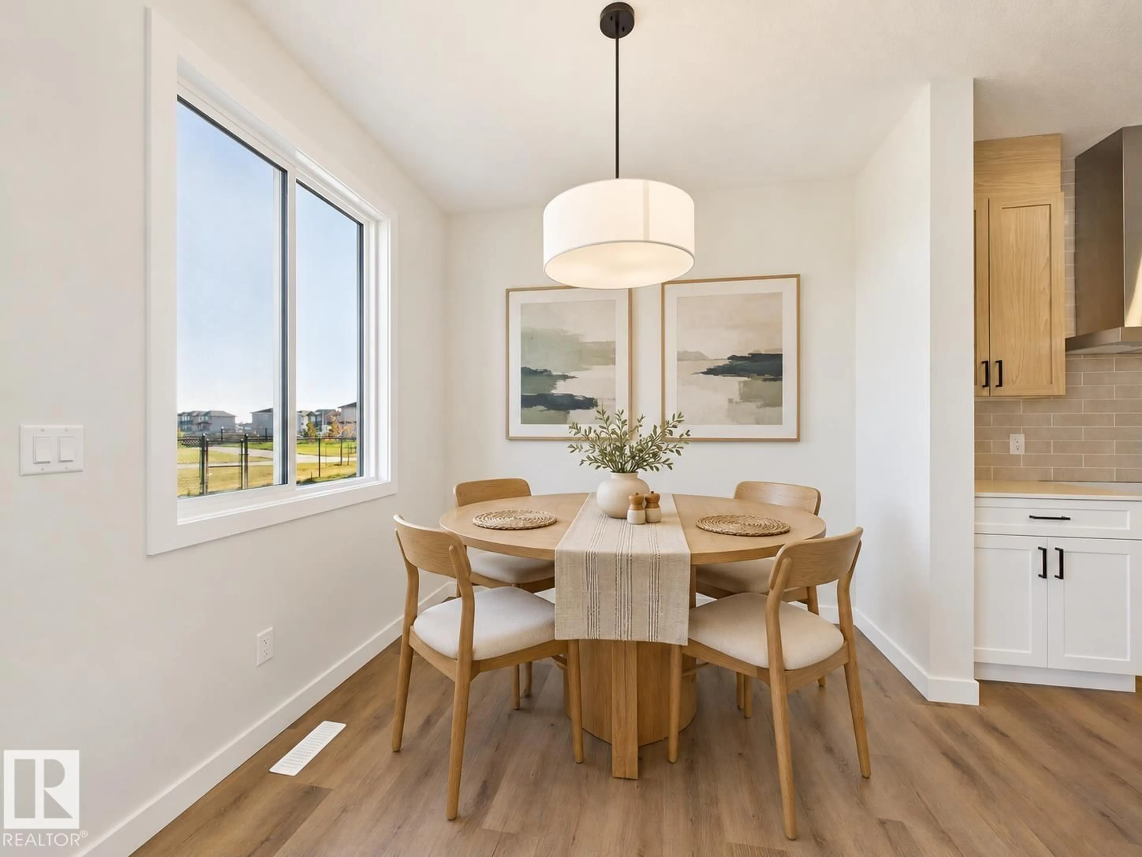 Dining room, wood/laminate floor for 49 SUMAC CL, Fort Saskatchewan Alberta T8L0Z9