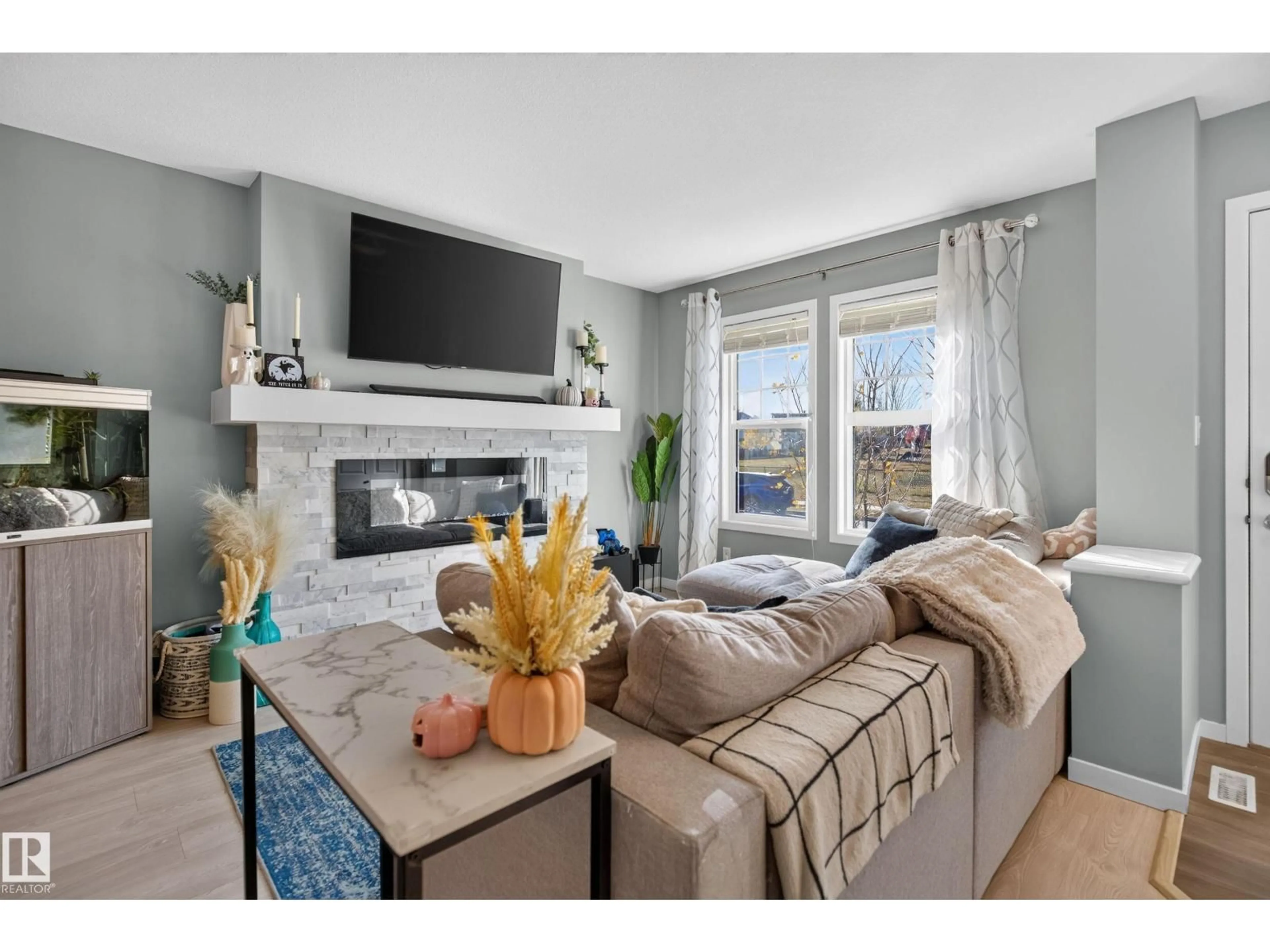 Living room with furniture, unknown for 1047 PAISLEY DR, Edmonton Alberta T6W4E1