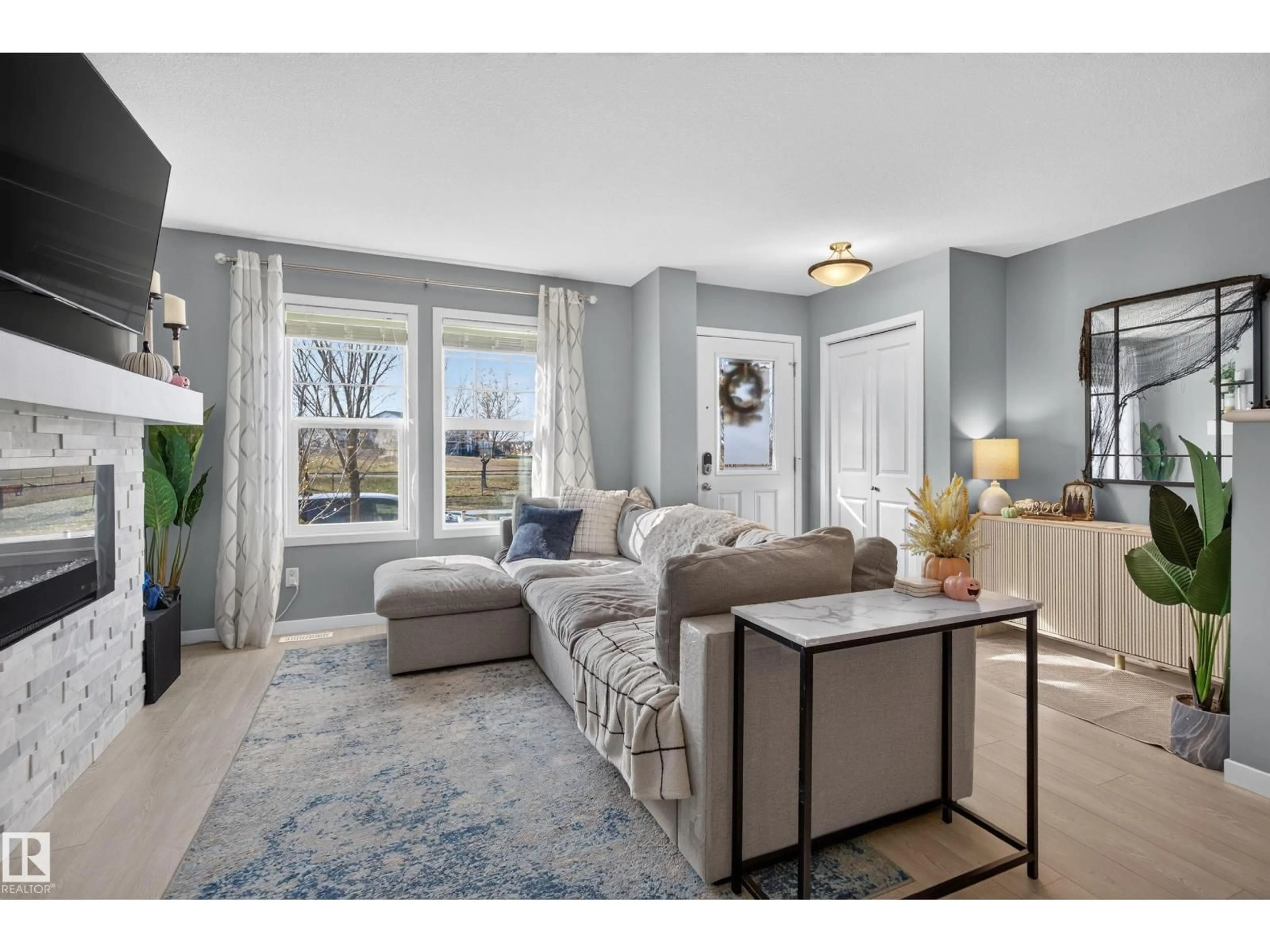 Living room with furniture, unknown for 1047 PAISLEY DR, Edmonton Alberta T6W4E1