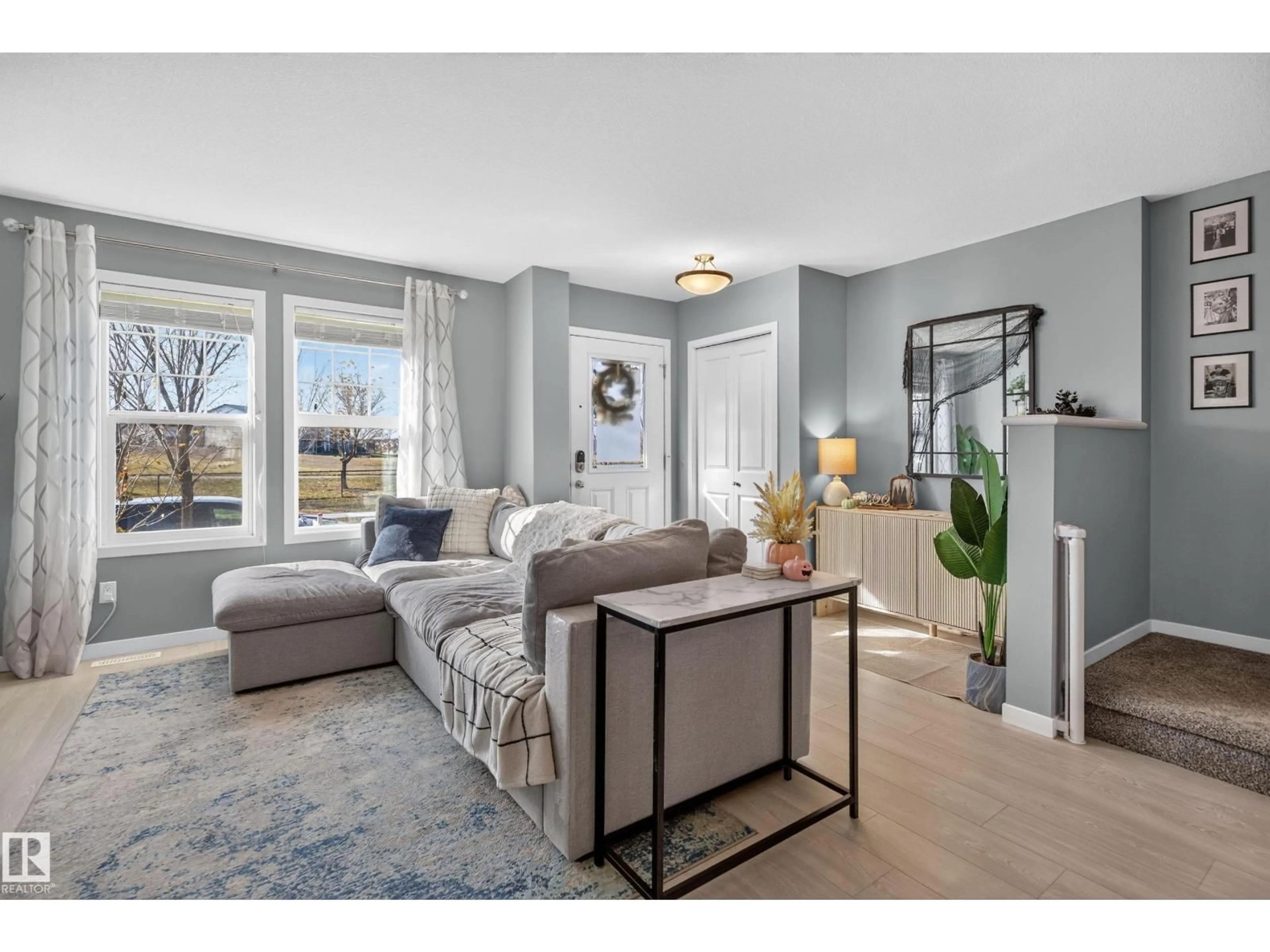 Living room with furniture, unknown for 1047 PAISLEY DR, Edmonton Alberta T6W4E1