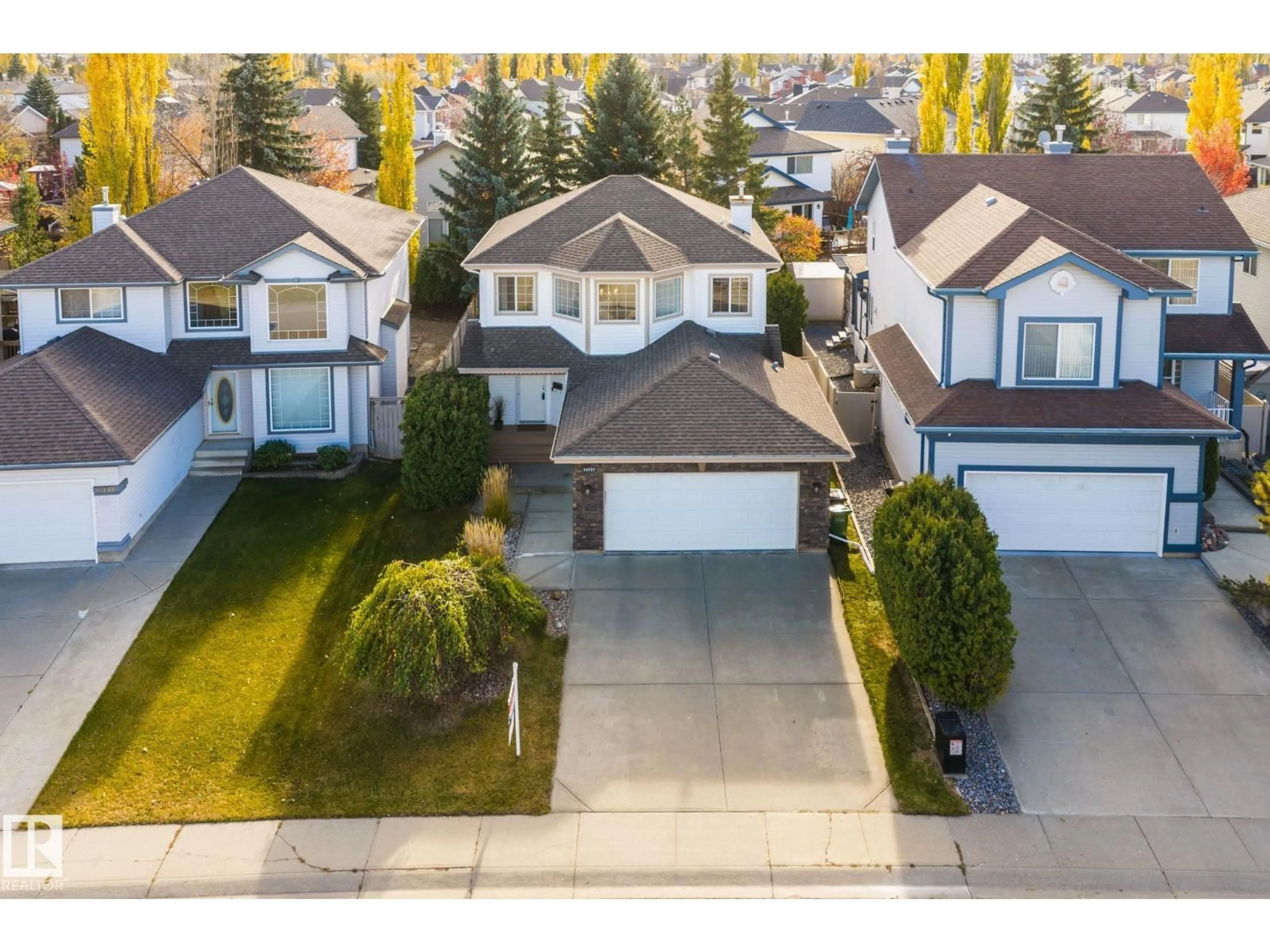 A pic from outside/outdoor area/front of a property/back of a property/a pic from drone, street for 11727 13 AV, Edmonton Alberta T6J7G1