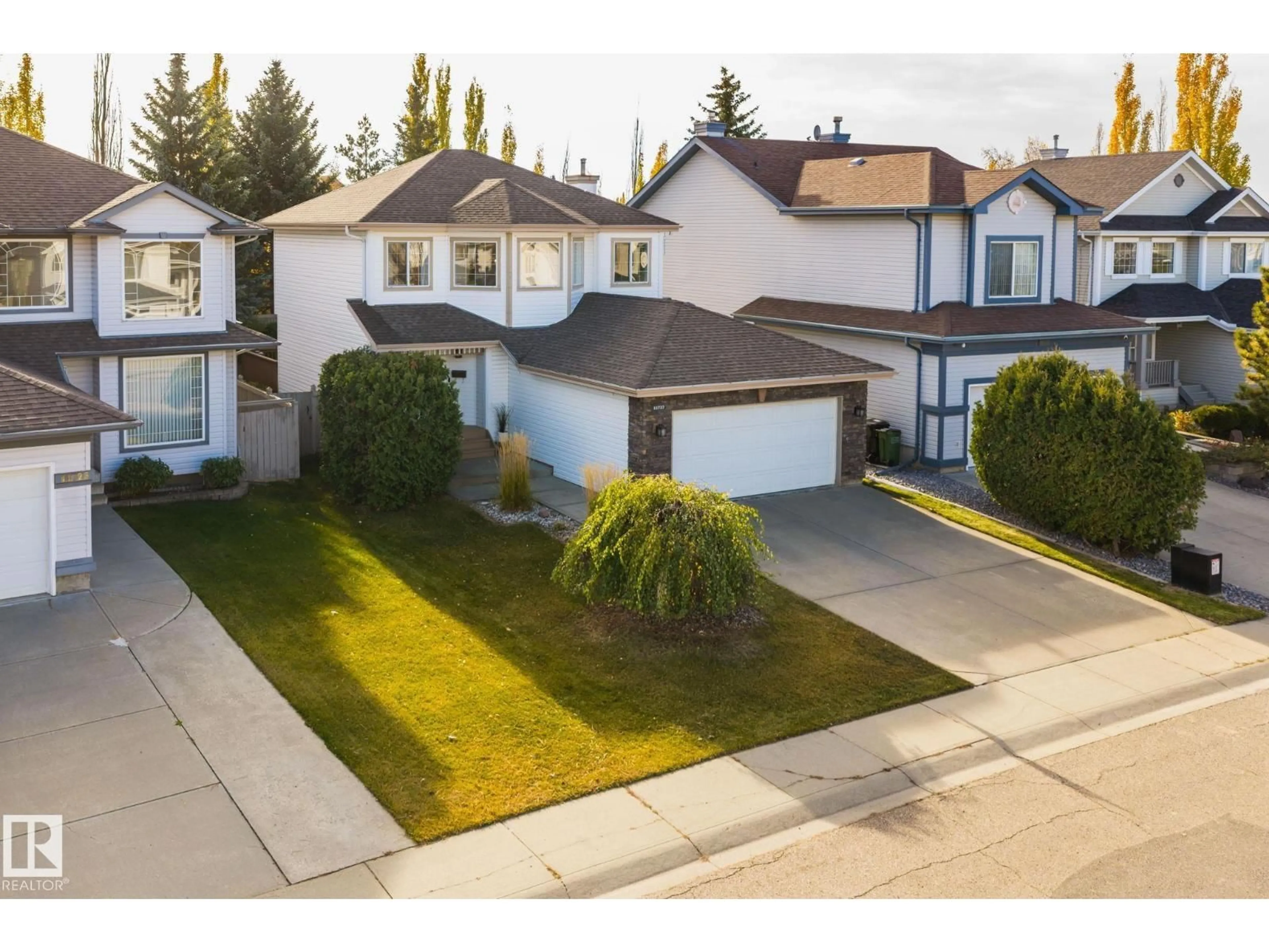 A pic from outside/outdoor area/front of a property/back of a property/a pic from drone, street for 11727 13 AV, Edmonton Alberta T6J7G1