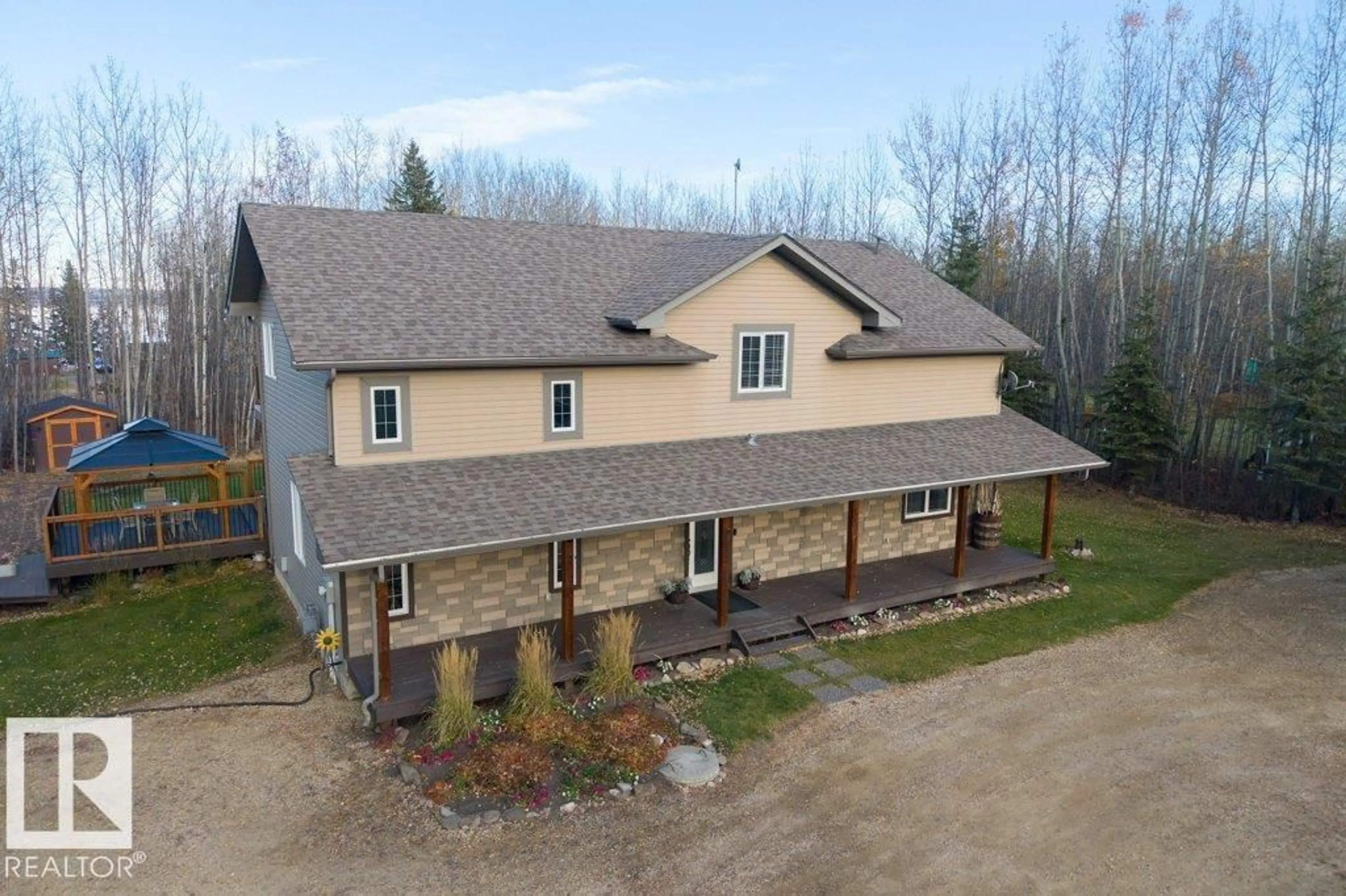 A pic from outside/outdoor area/front of a property/back of a property/a pic from drone, building for 144 462054 RGE ROAD 11, Rural Wetaskiwin County Alberta T0C2V0