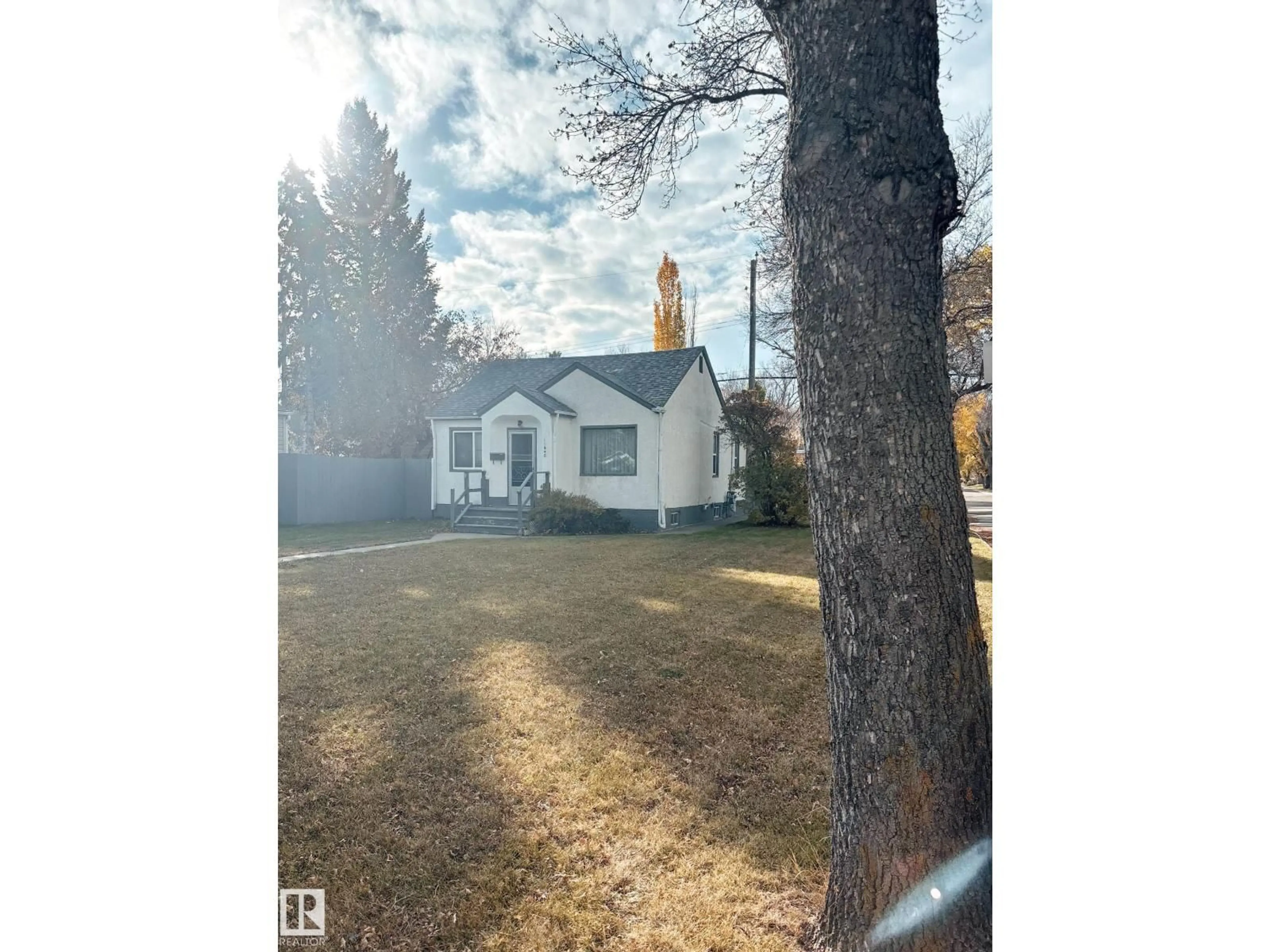 A pic from outside/outdoor area/front of a property/back of a property/a pic from drone, street for 11448 65 ST, Edmonton Alberta T5W4K8