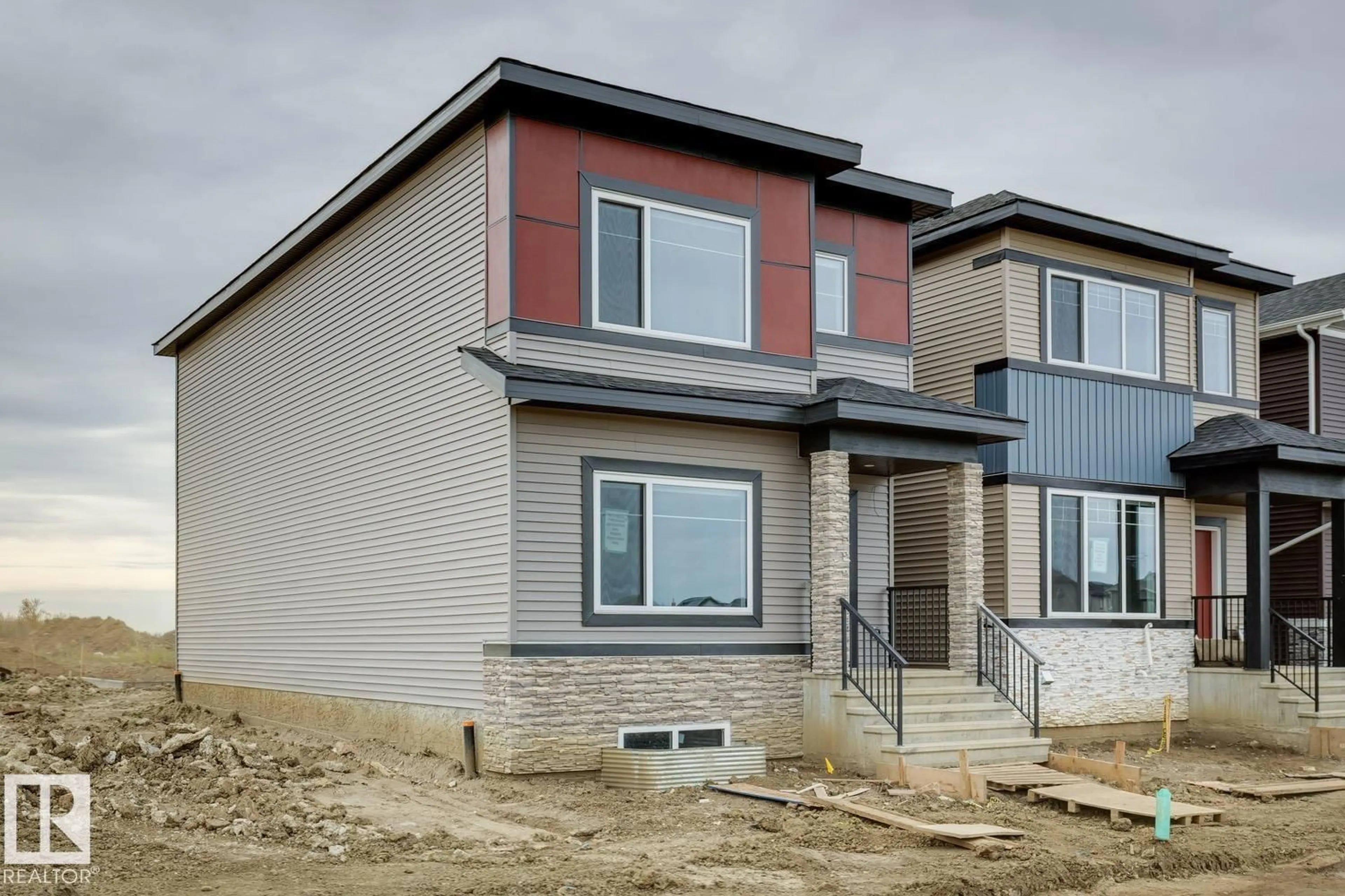 Home with brick exterior material, street for 496 ROBINSON BV, Leduc Alberta T9E1Z3