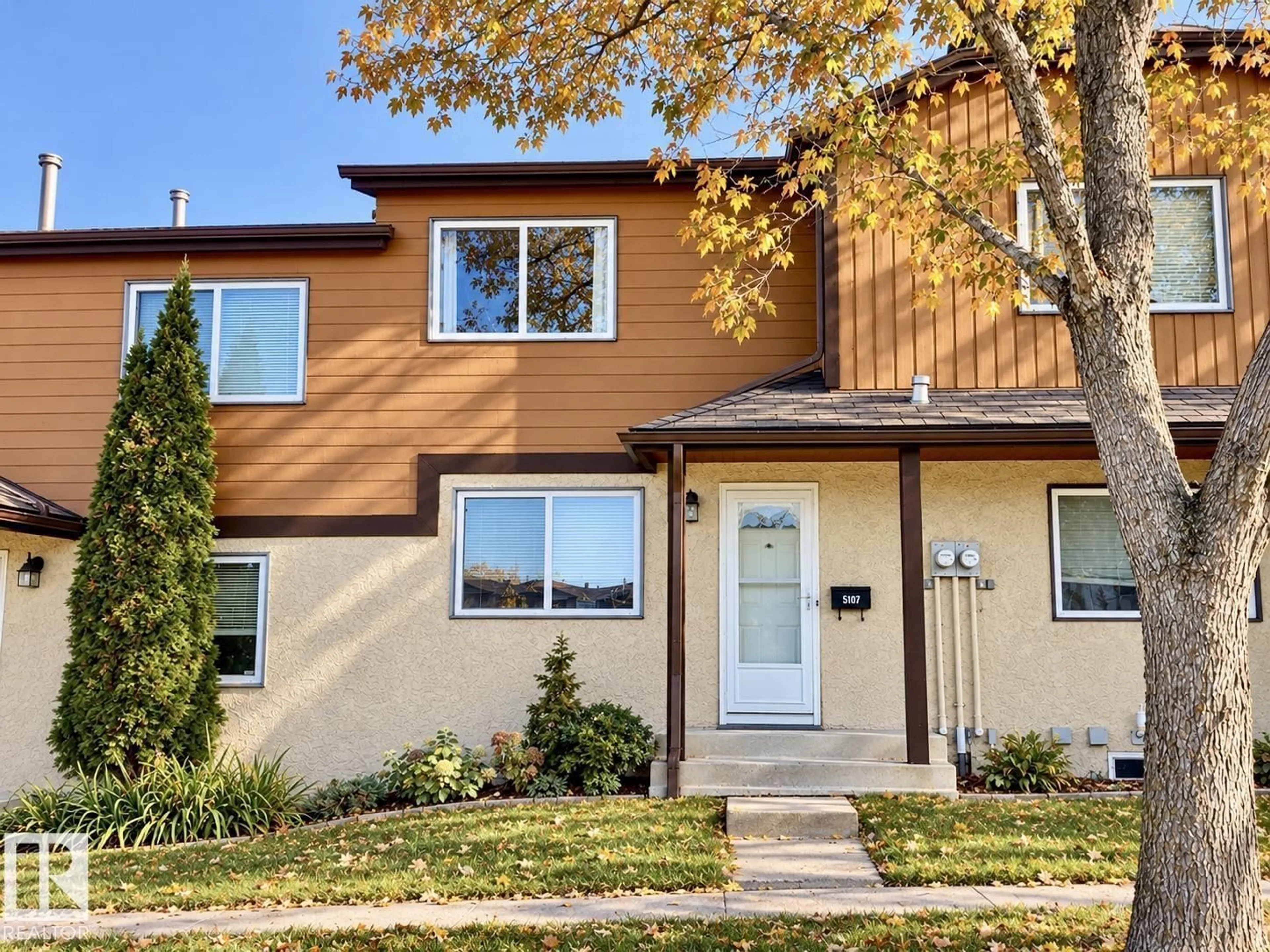 Home with vinyl exterior material, street for 5107 146 AV, Edmonton Alberta T5A4M7