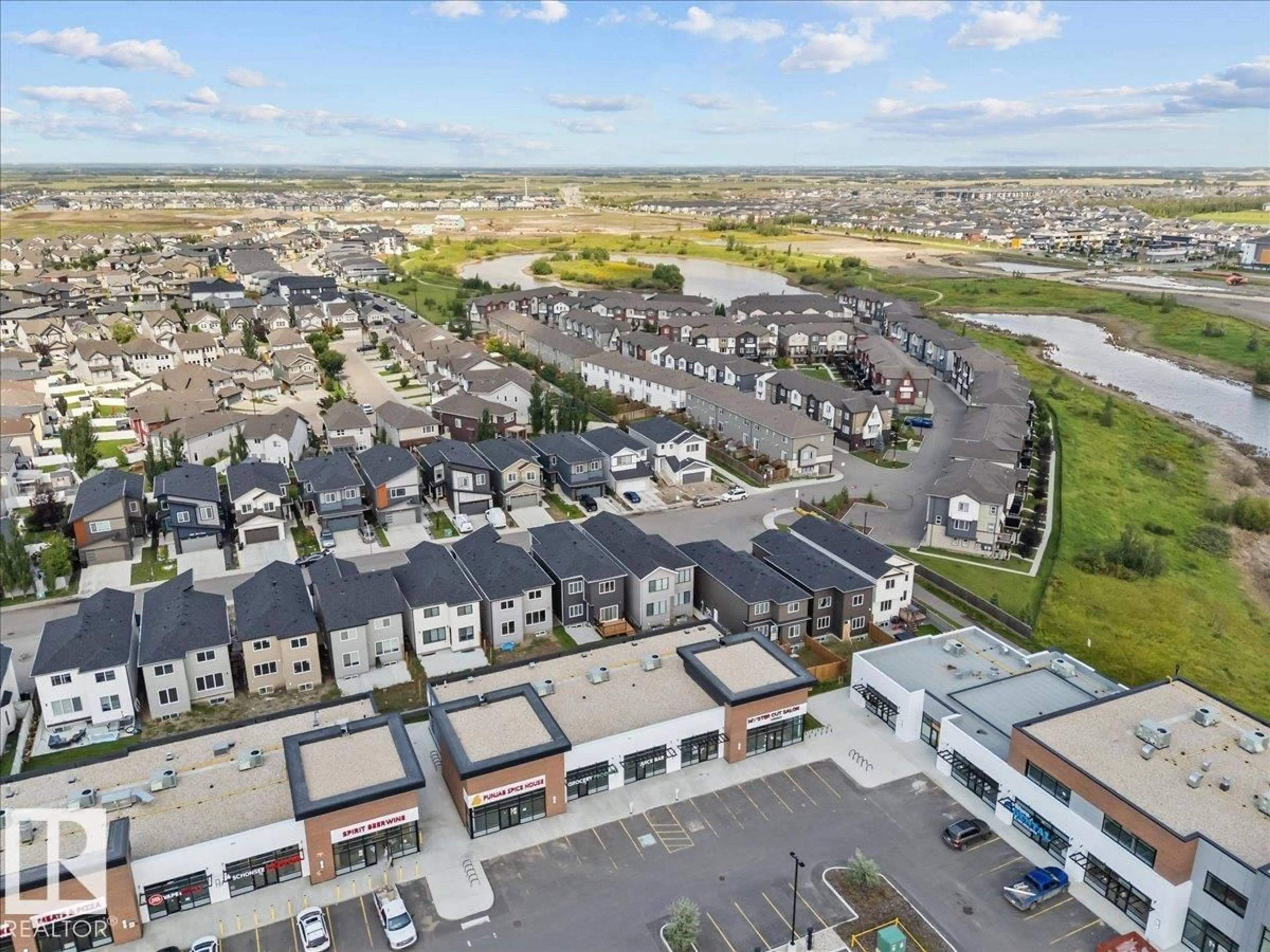 A pic from outside/outdoor area/front of a property/back of a property/a pic from drone, unknown for NW - 6903 169 AV, Edmonton Alberta T5Z0H2