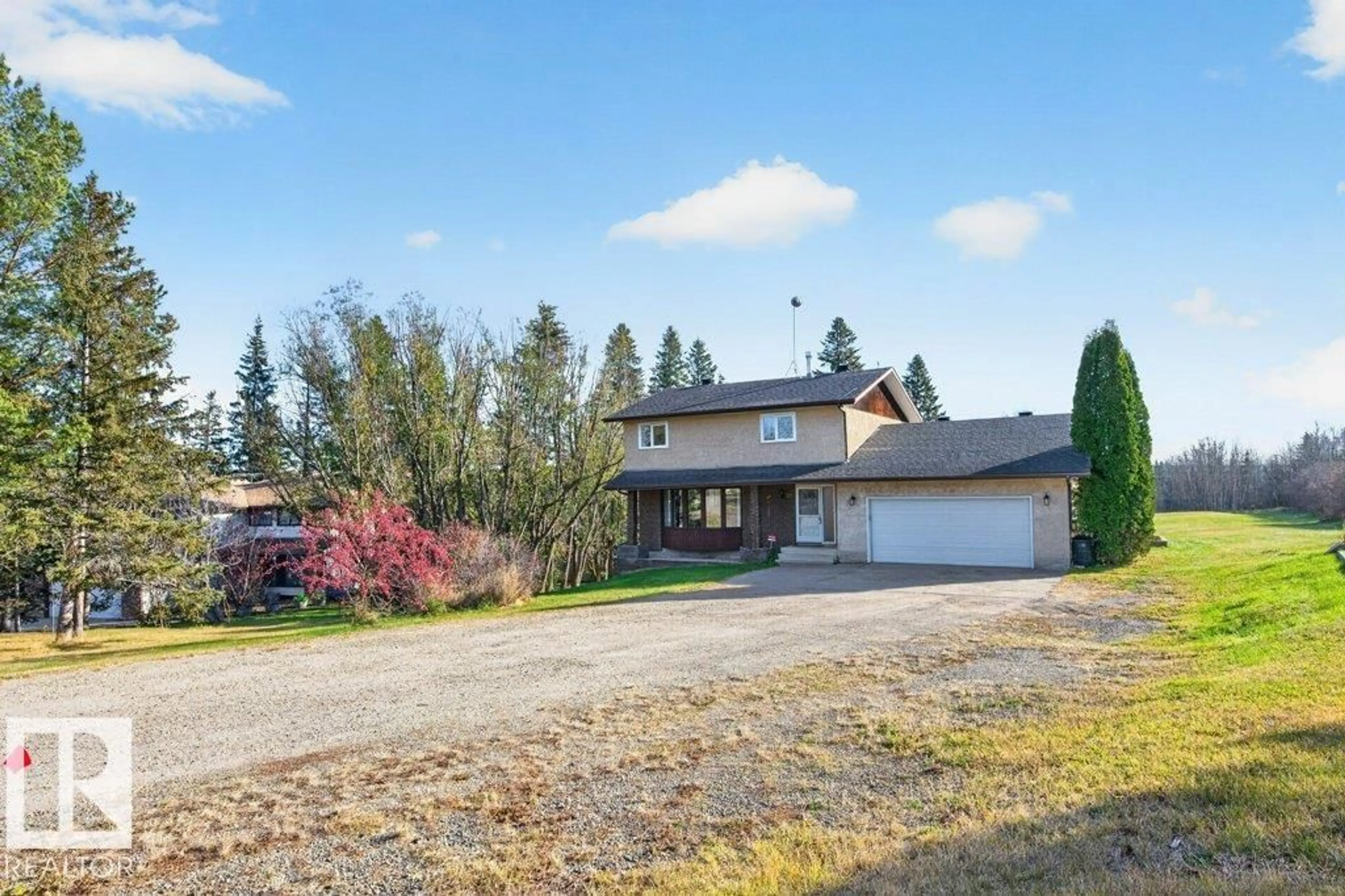 A pic from outside/outdoor area/front of a property/back of a property/a pic from drone, unknown for 70 56019 RGE ROAD 230, Rural Sturgeon County Alberta T0A1N2