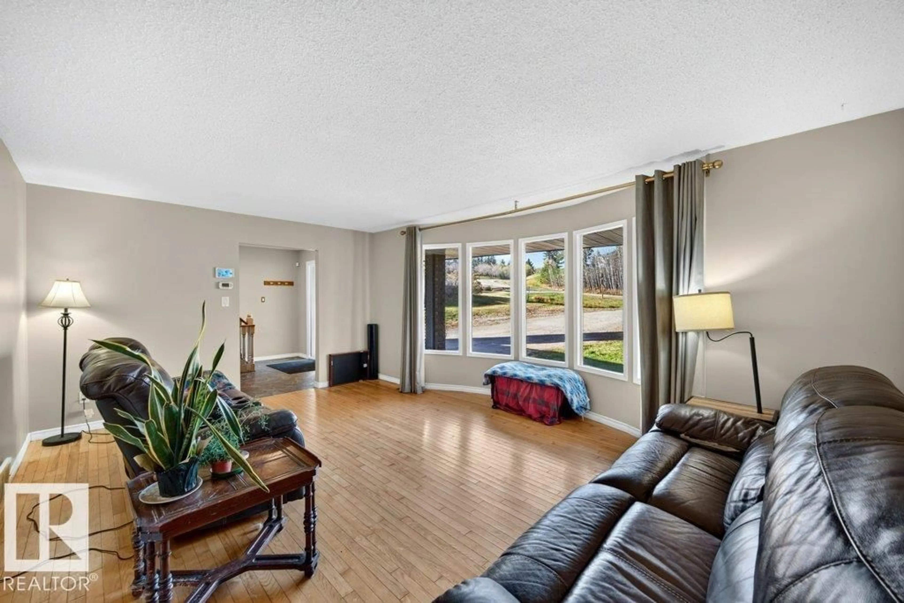 Living room with furniture, unknown for 70 56019 RGE ROAD 230, Rural Sturgeon County Alberta T0A1N2