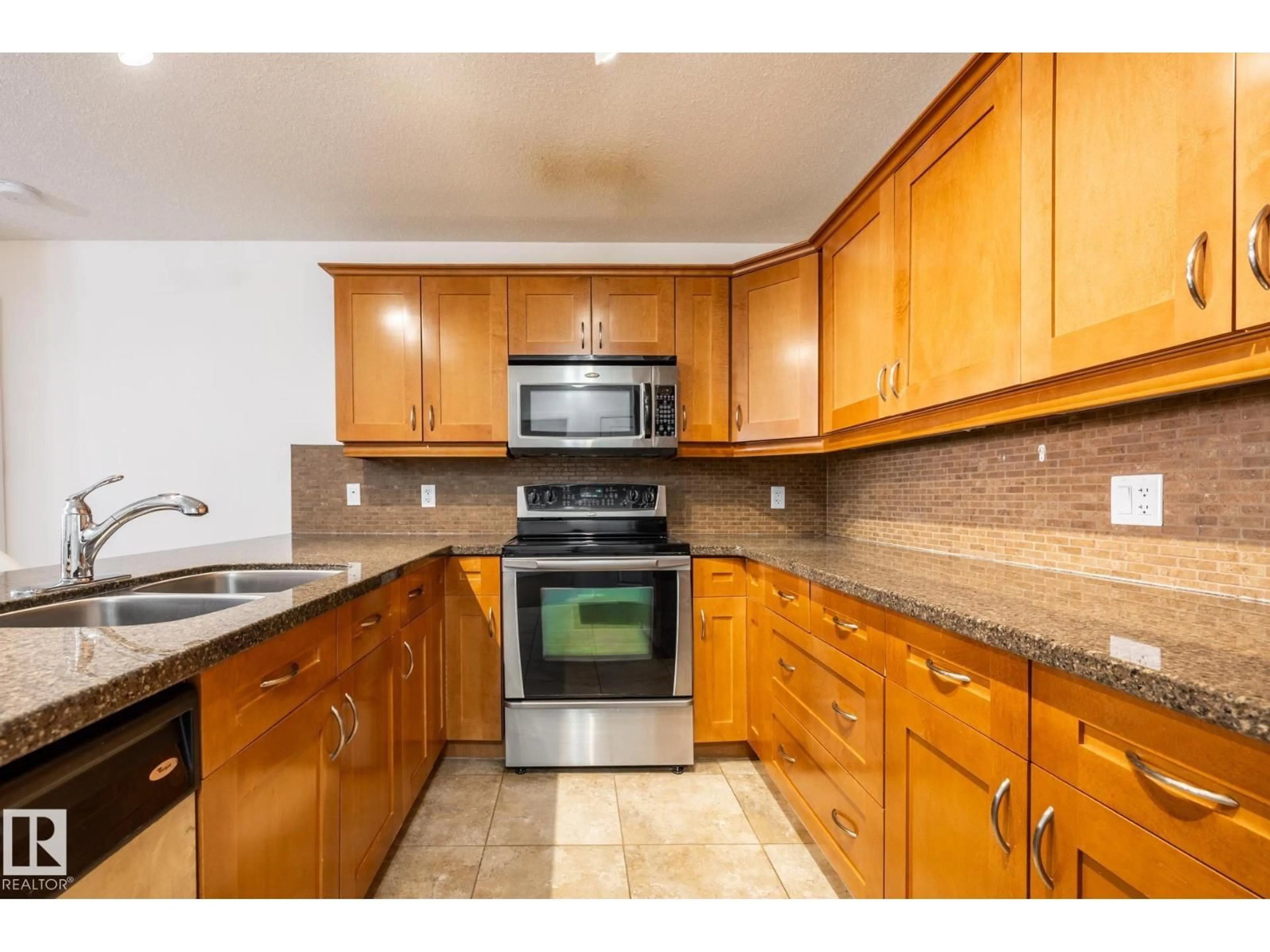 Standard kitchen, ceramic/tile floor for 207 - 400 PALISADES WY, Sherwood Park Alberta T8H0H4