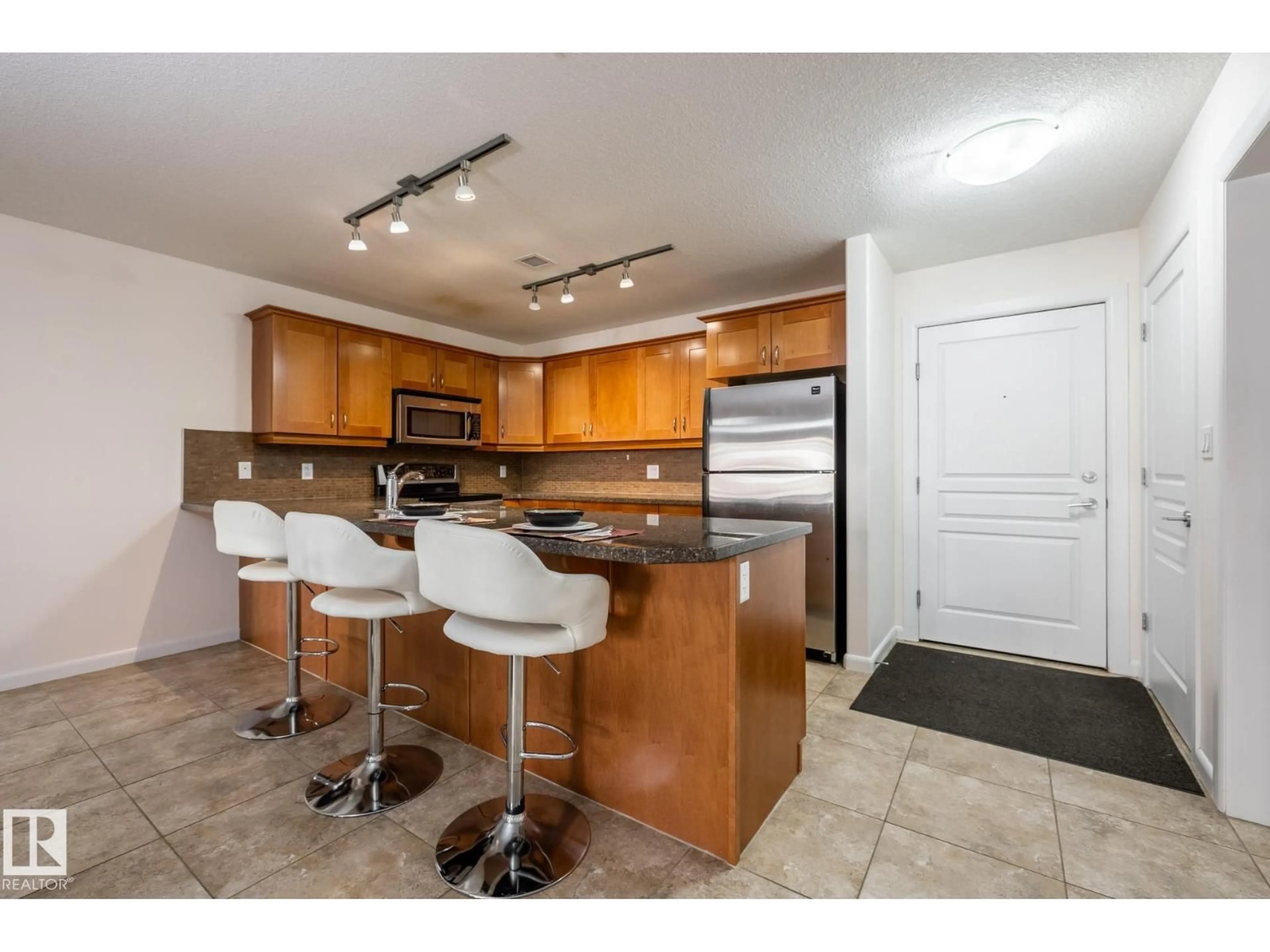 Open concept kitchen, unknown for 207 - 400 PALISADES WY, Sherwood Park Alberta T8H0H4