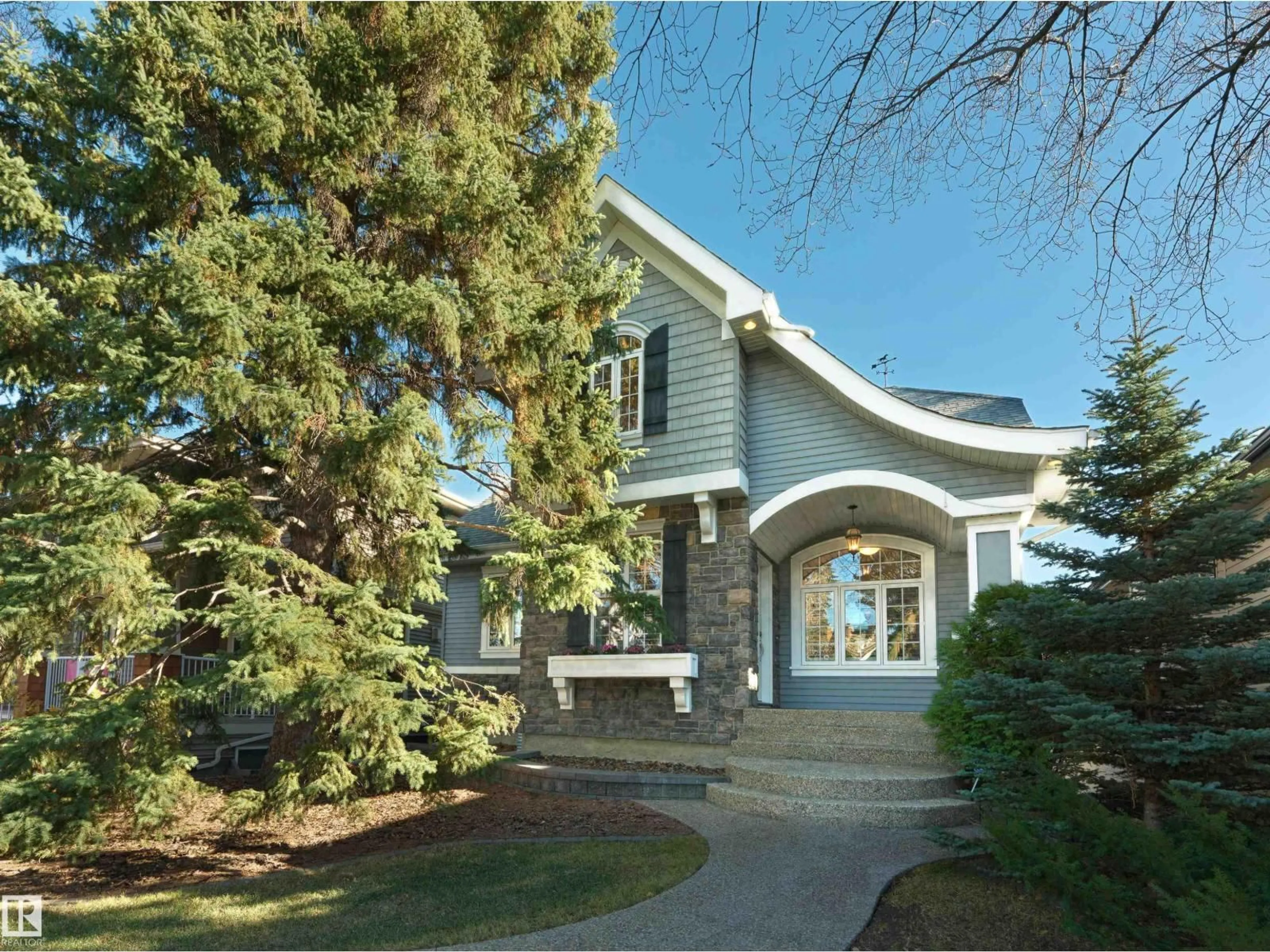 Home with vinyl exterior material, street for NW - 7117 119 ST, Edmonton Alberta T6G1V7