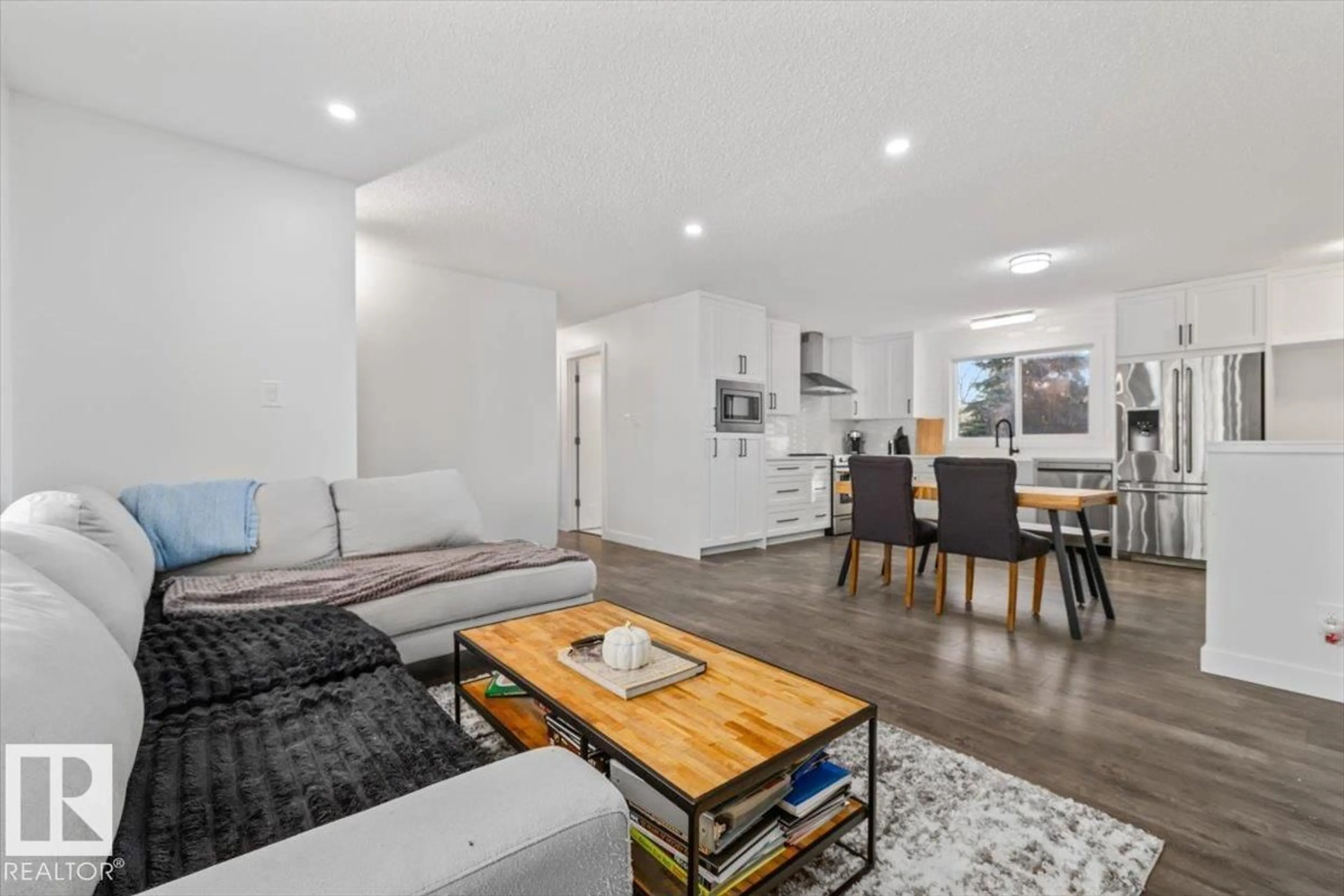Living room with furniture, wood/laminate floor for 42 GLENGARRY CR, Sherwood Park Alberta T8A3A2