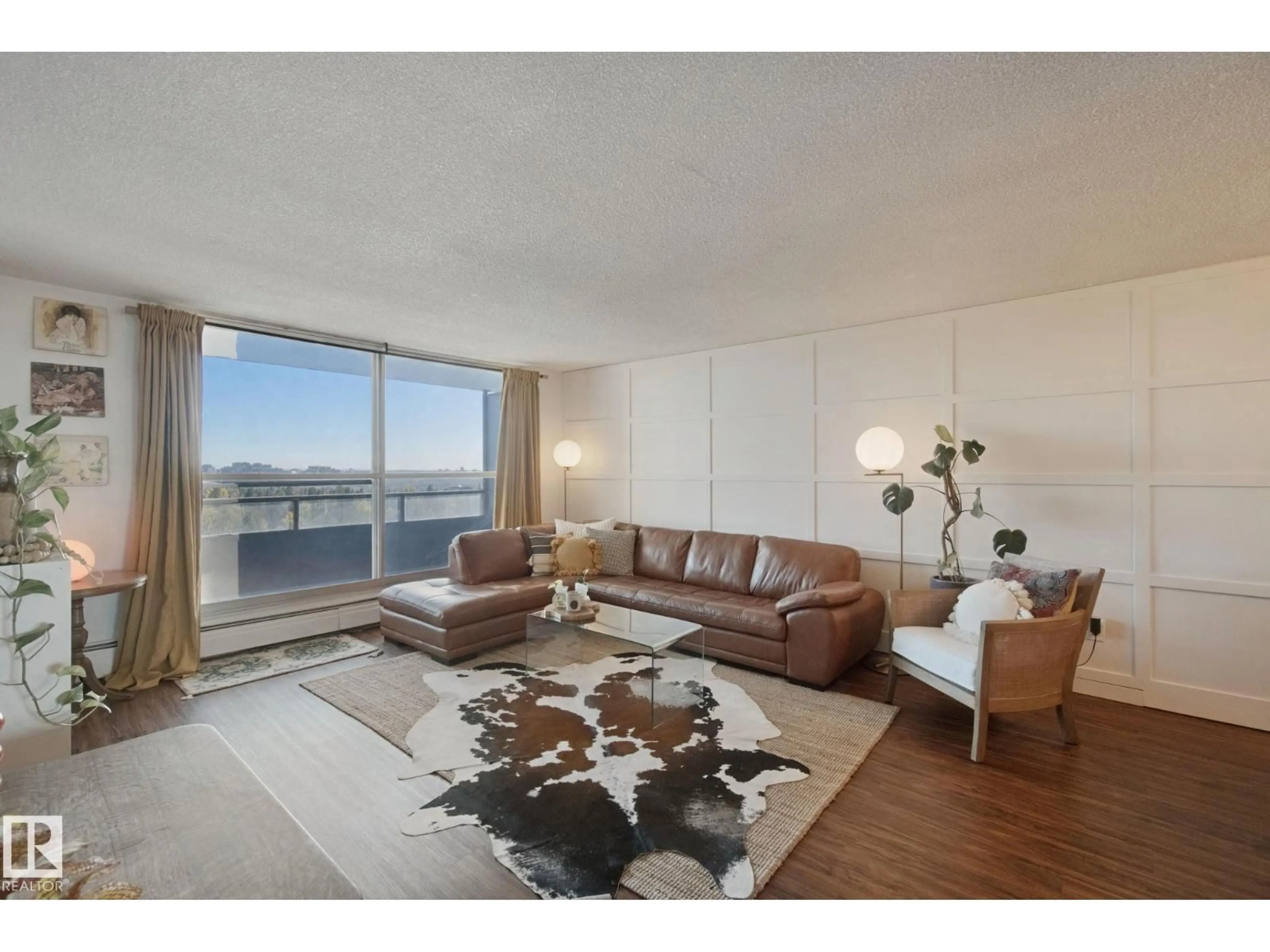Living room with furniture, unknown for 1114 STONY PLAIN RD, Edmonton Alberta T5N3R2