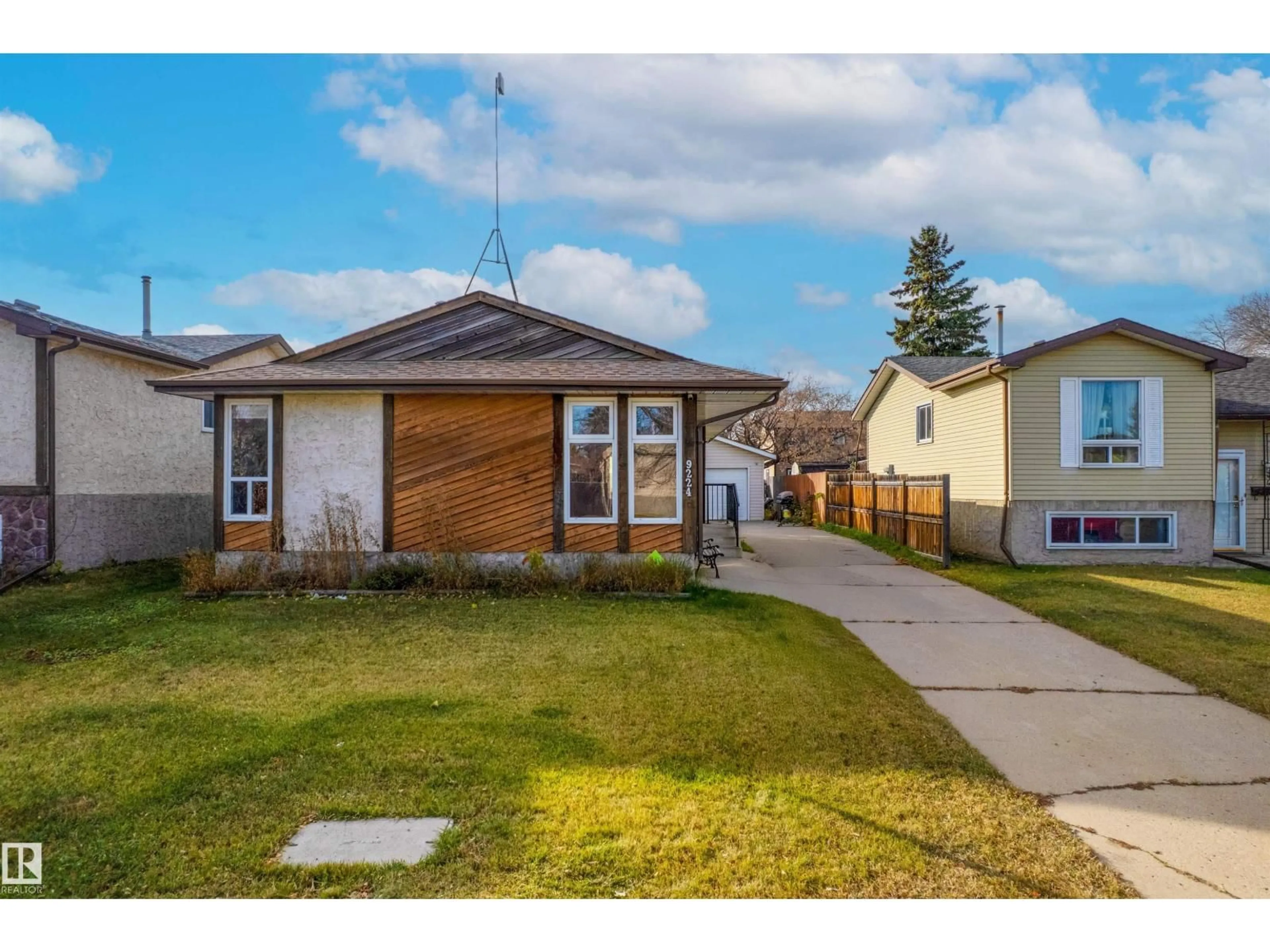 Home with vinyl exterior material, street for 9224 82 ST, Fort Saskatchewan Alberta T8L3P2