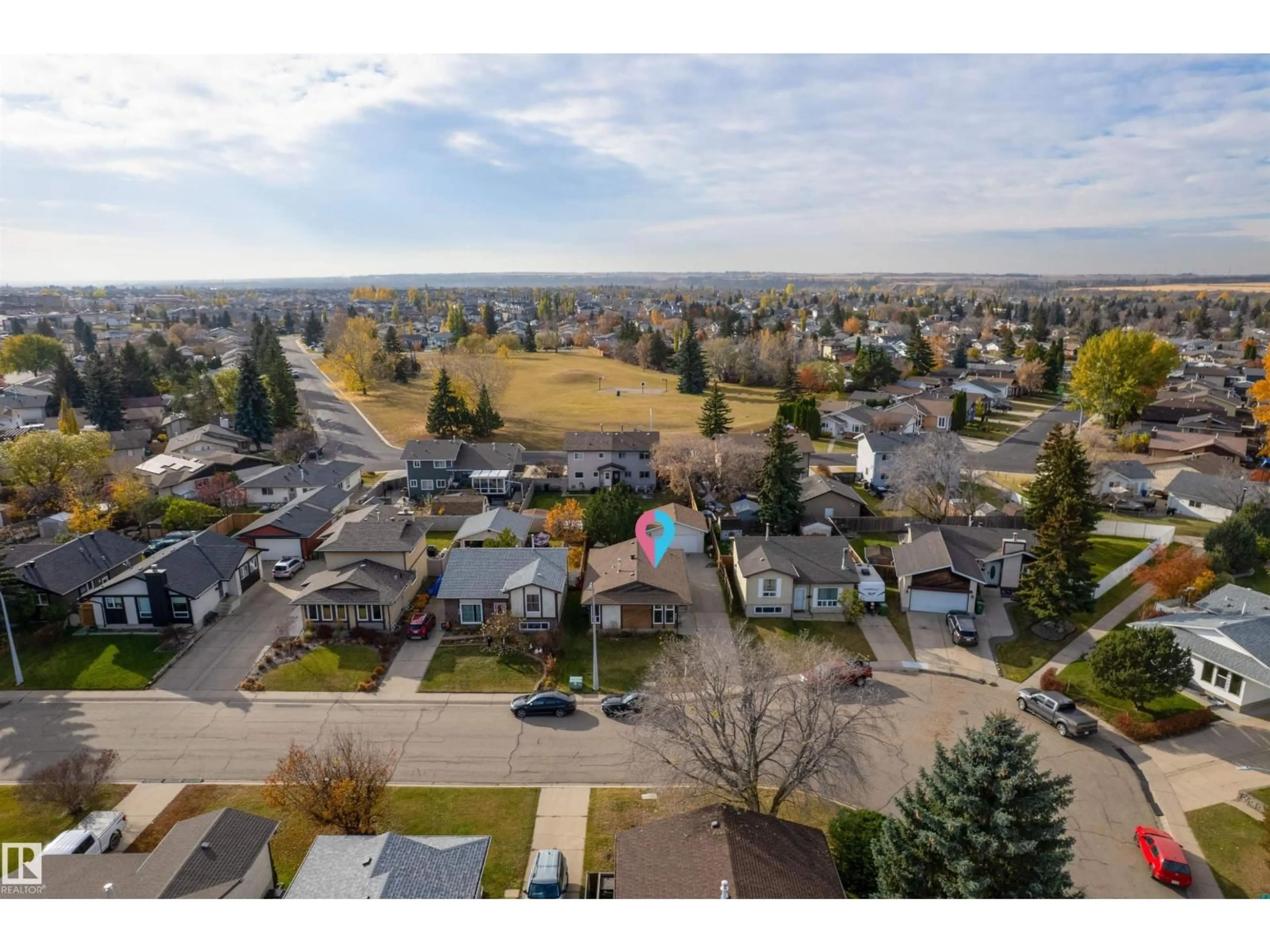 A pic from outside/outdoor area/front of a property/back of a property/a pic from drone, mountain view for 9224 82 ST, Fort Saskatchewan Alberta T8L3P2