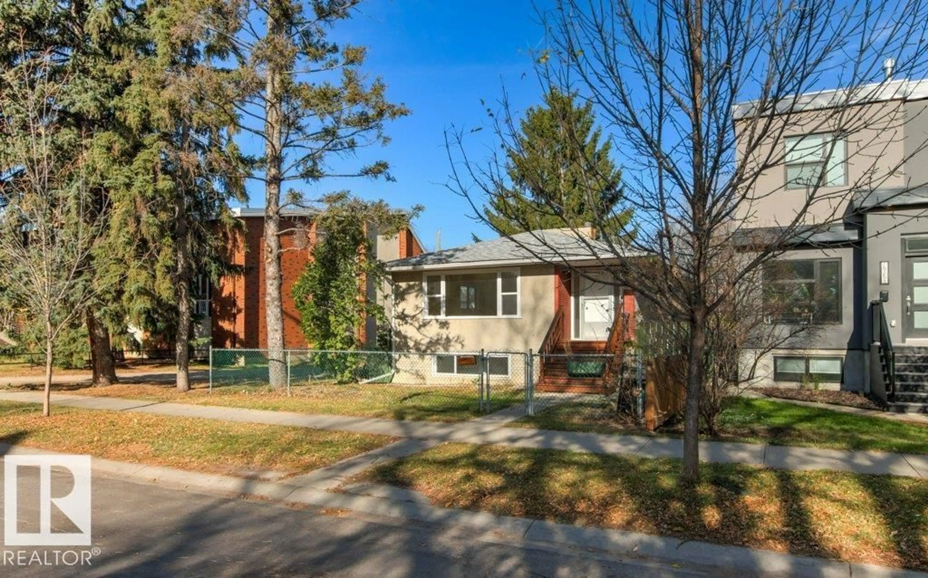 Home with brick exterior material, street for 9640 74 AV, Edmonton Alberta T6E1E6