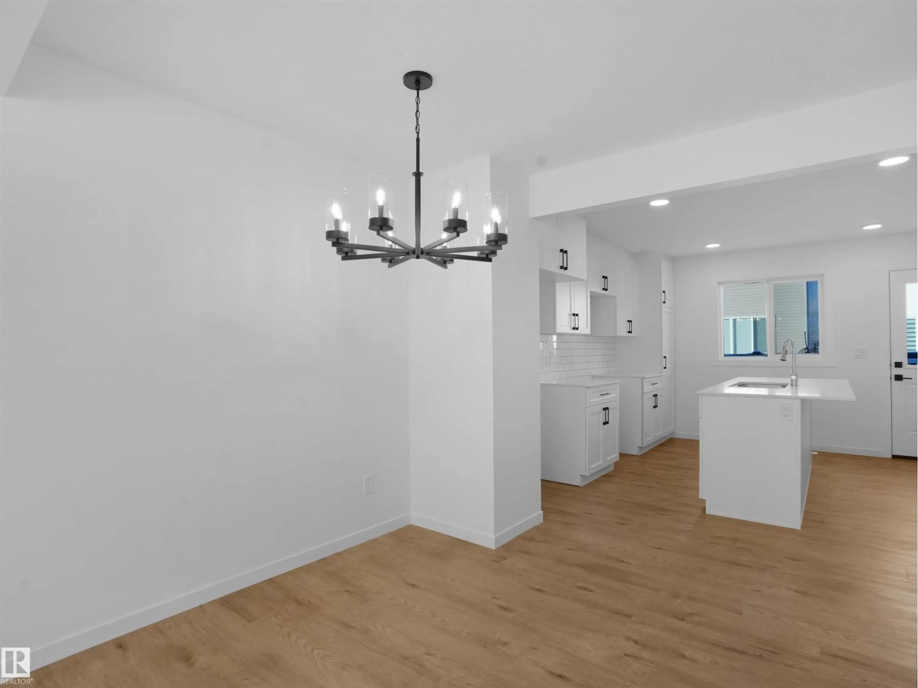 Open concept kitchen, unknown for NW - 18632 18 AV, Edmonton Alberta T6M3E8