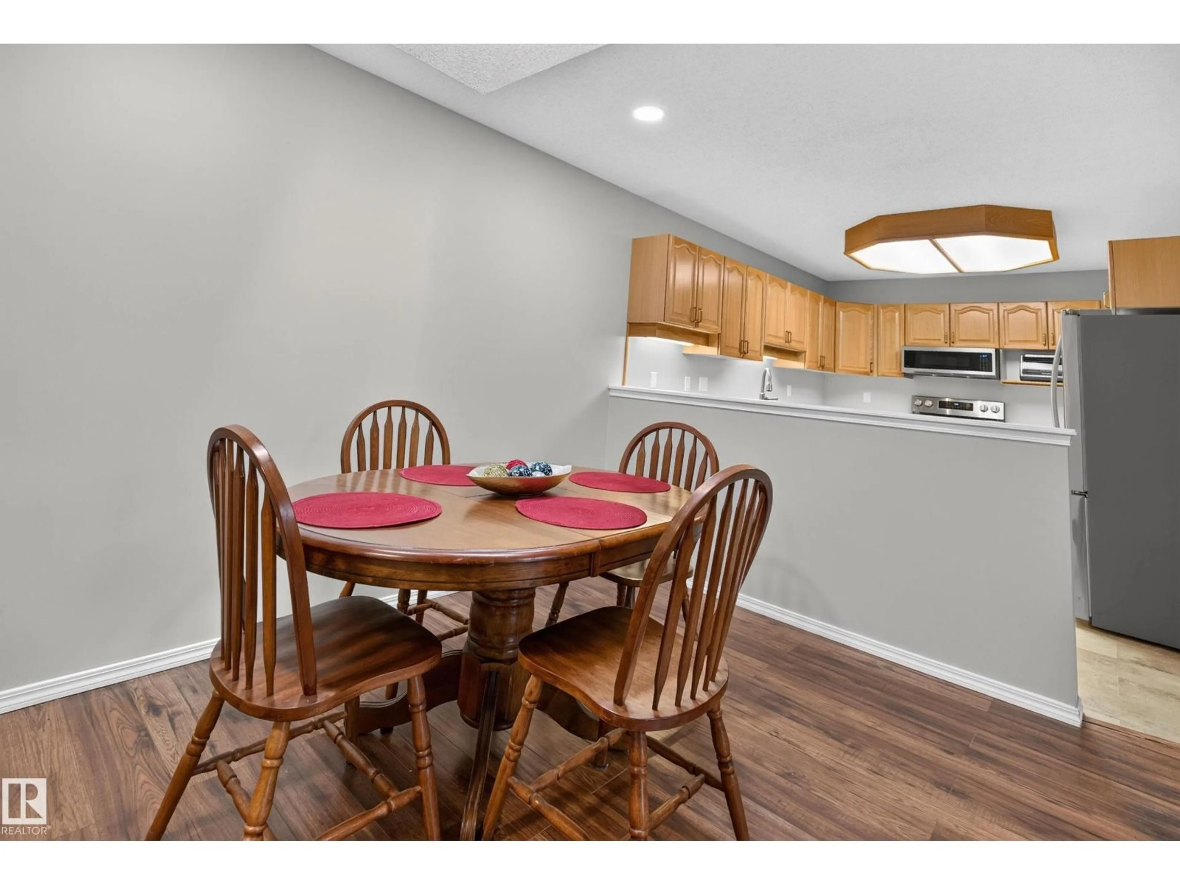 Dining room, wood/laminate floor for 303 GERVAIS RD, St. Albert Alberta T8N6H7