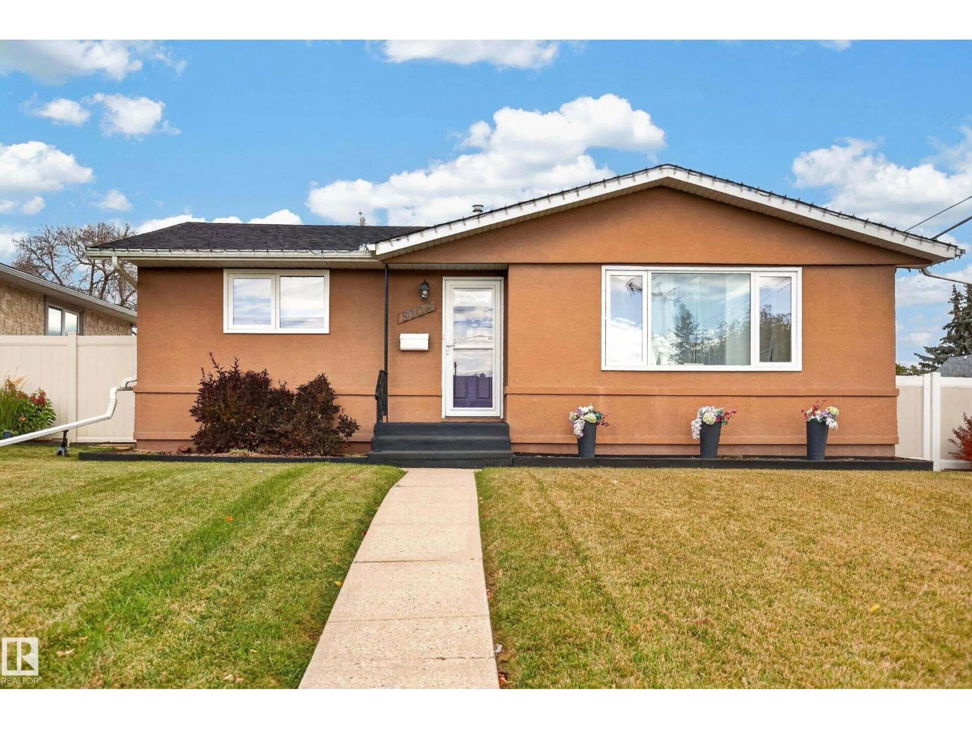 Home with vinyl exterior material, street for 9108 132A AV NW, Edmonton Alberta T5E1B5