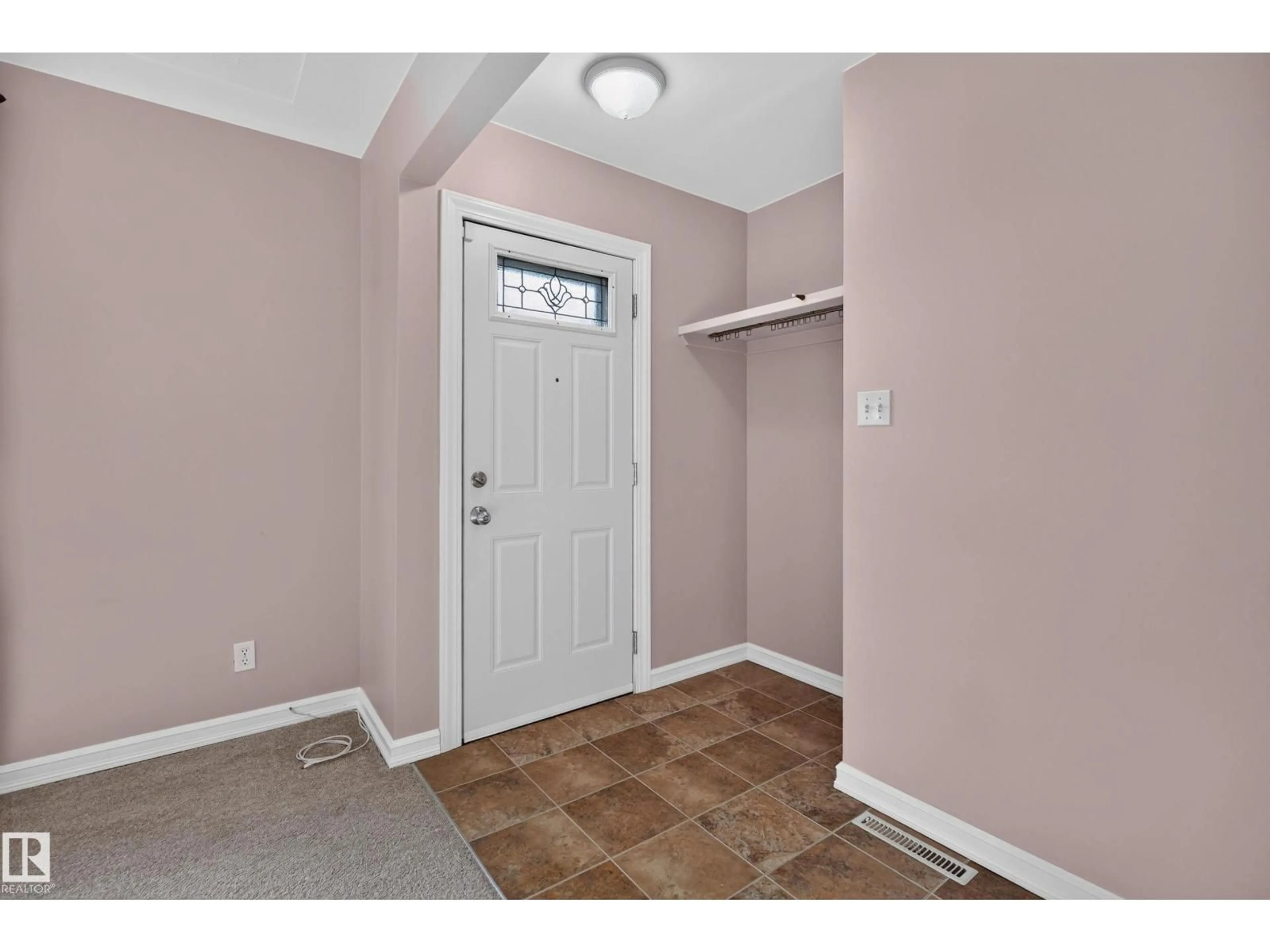 Indoor entryway for 9108 132A AV NW, Edmonton Alberta T5E1B5