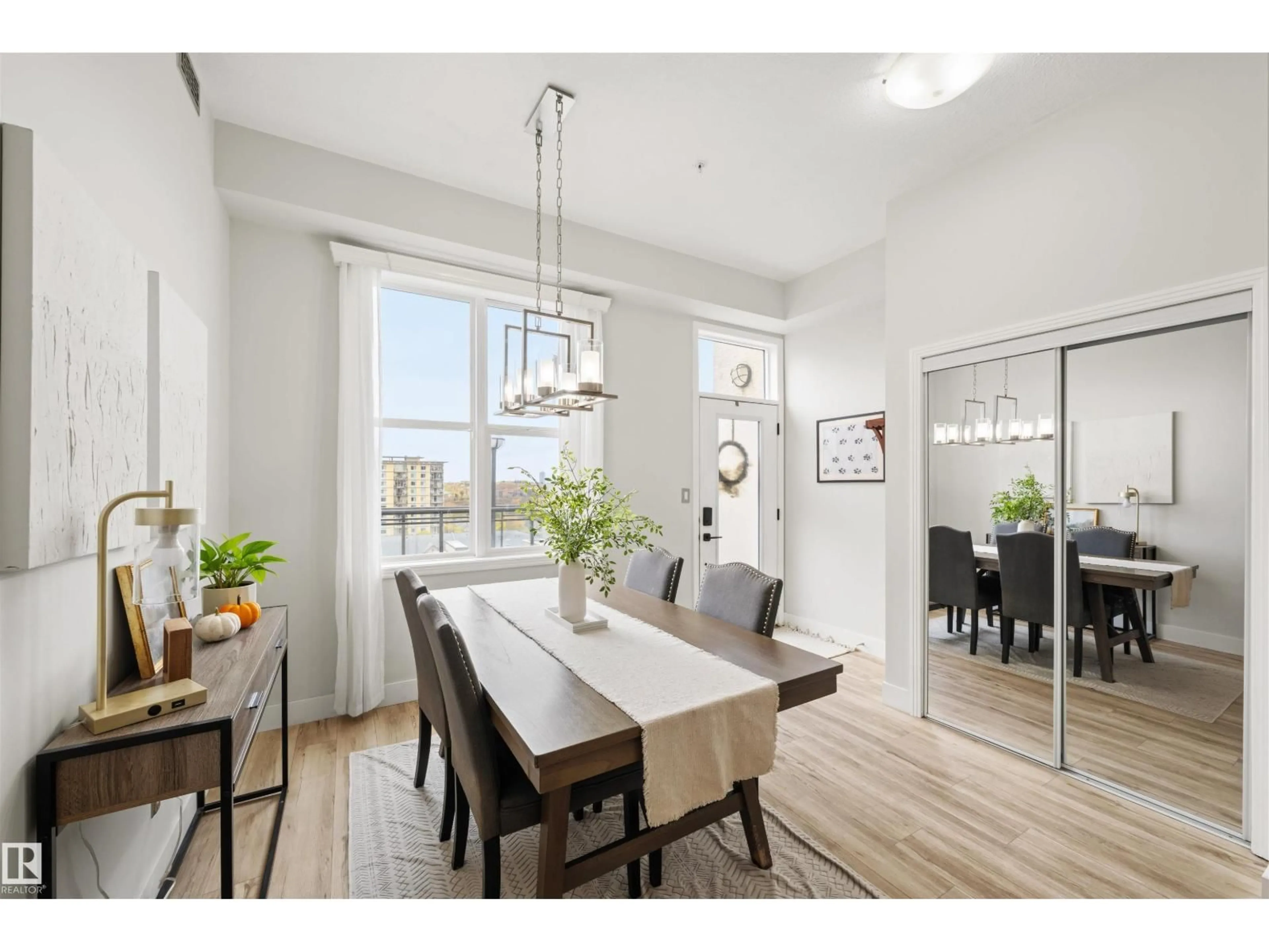 Dining room, wood/laminate floor for #714 - 10503 98 AV, Edmonton Alberta T5K0B2