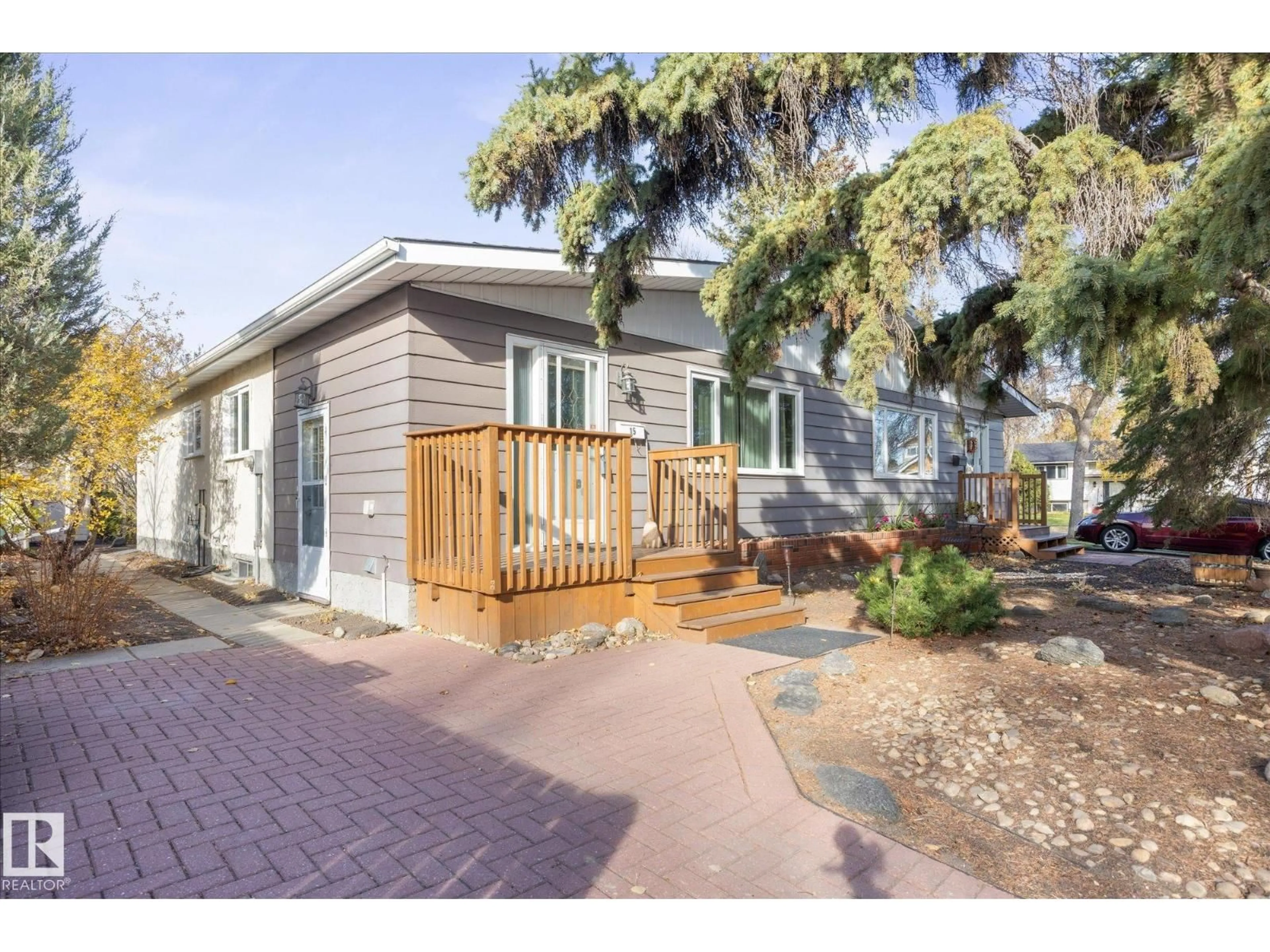 Home with vinyl exterior material, street for 15 FALCON CR, St. Albert Alberta T8N1V1