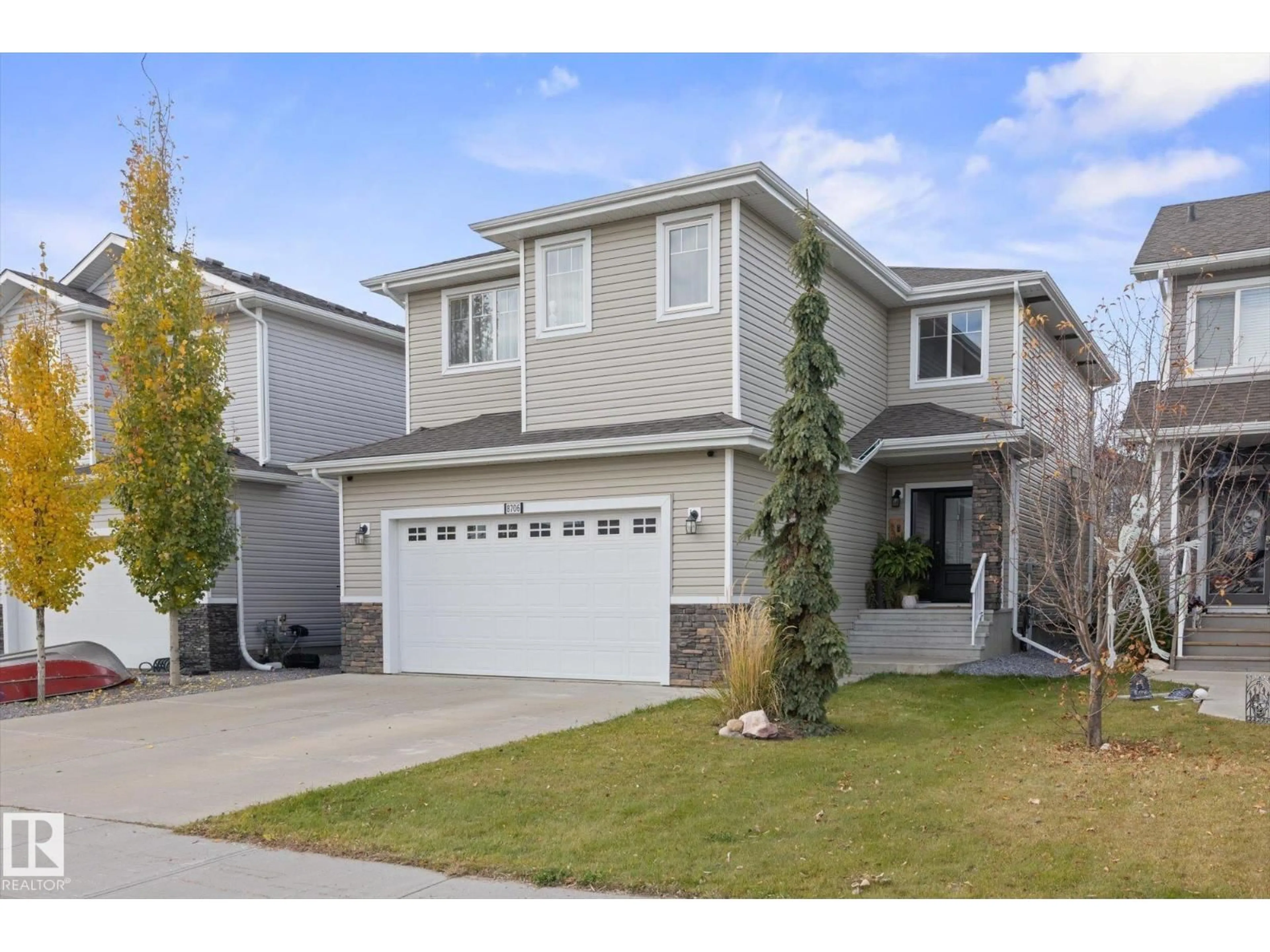 Home with vinyl exterior material, street for 8706 96A, Morinville Alberta T8R2N9