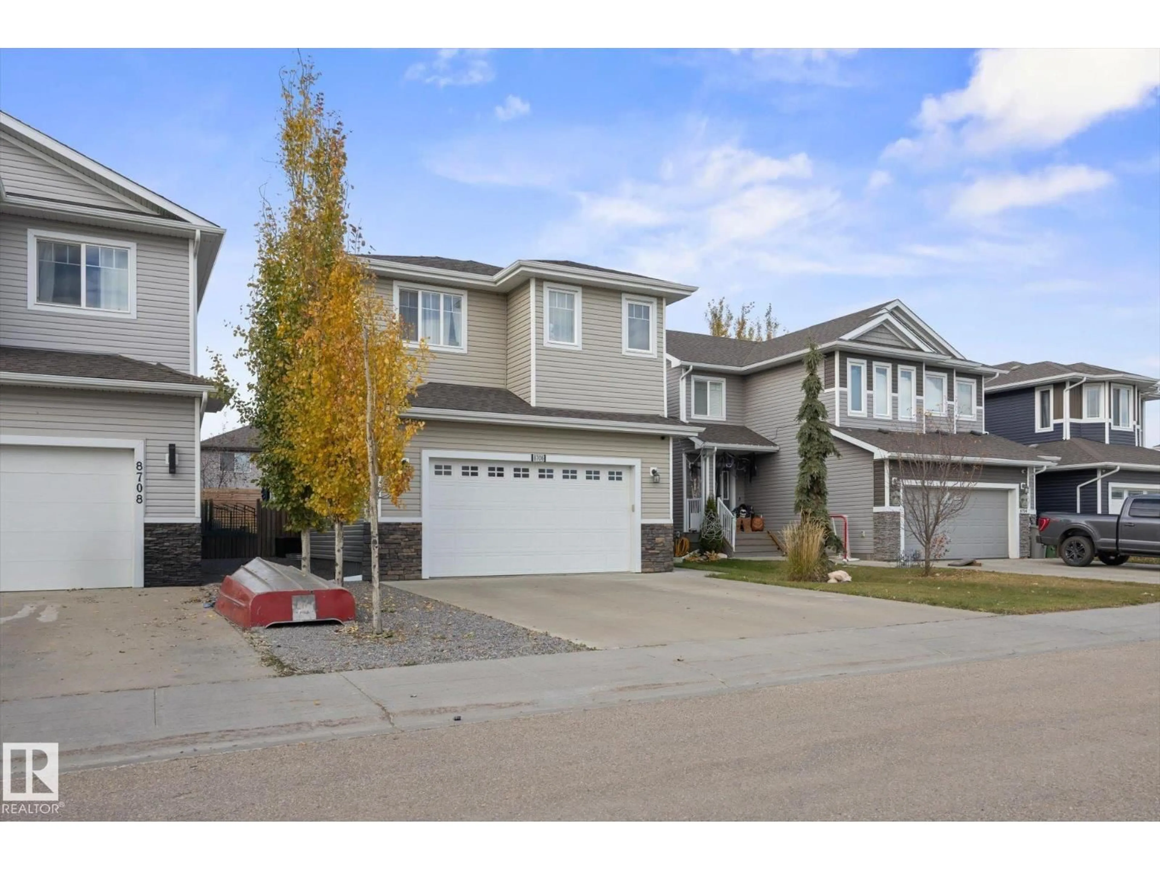 Home with vinyl exterior material, street for 8706 96A, Morinville Alberta T8R2N9