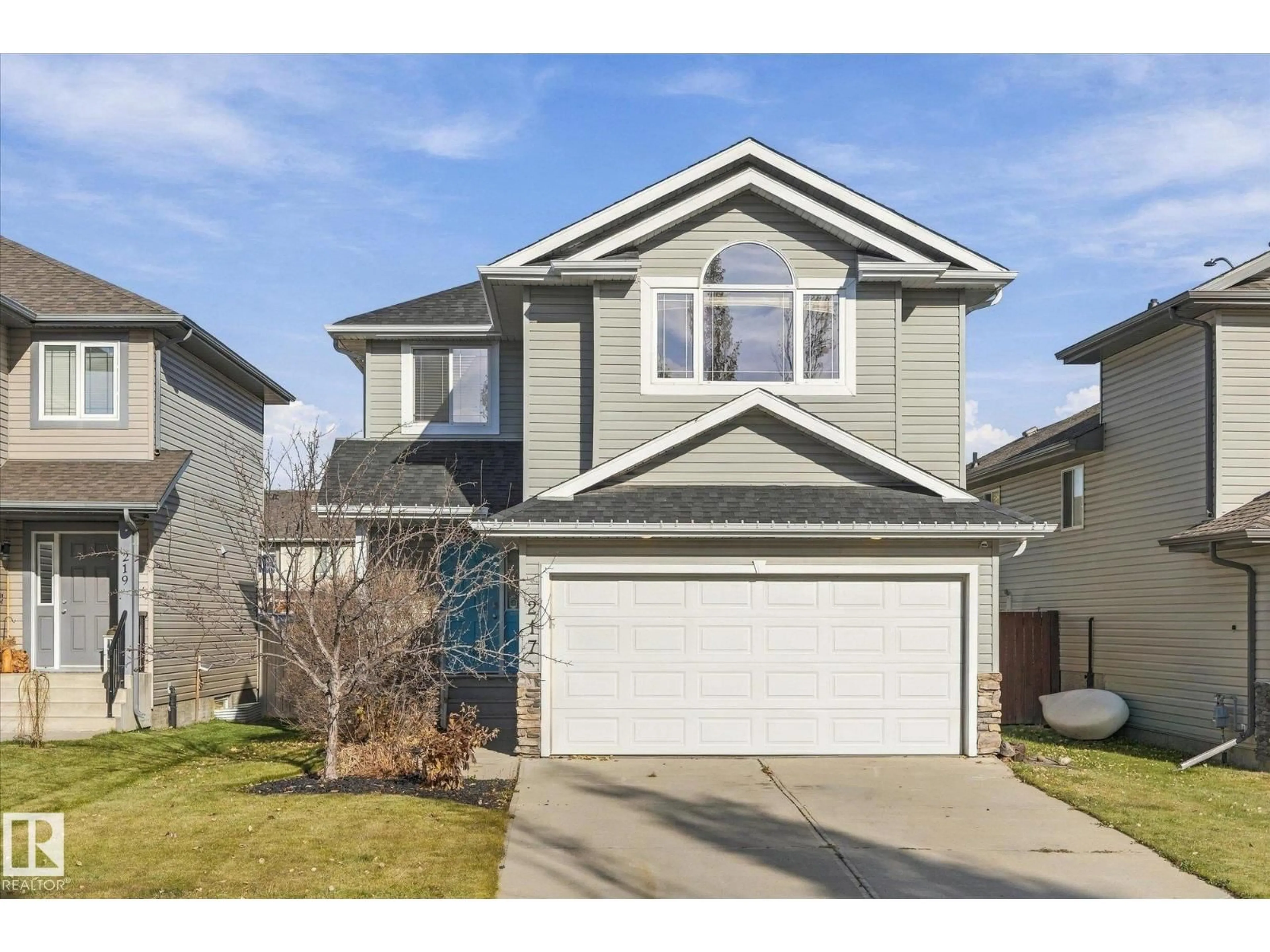 Home with vinyl exterior material, street for 217 SILVERSTONE CR, Stony Plain Alberta T7Z0E8