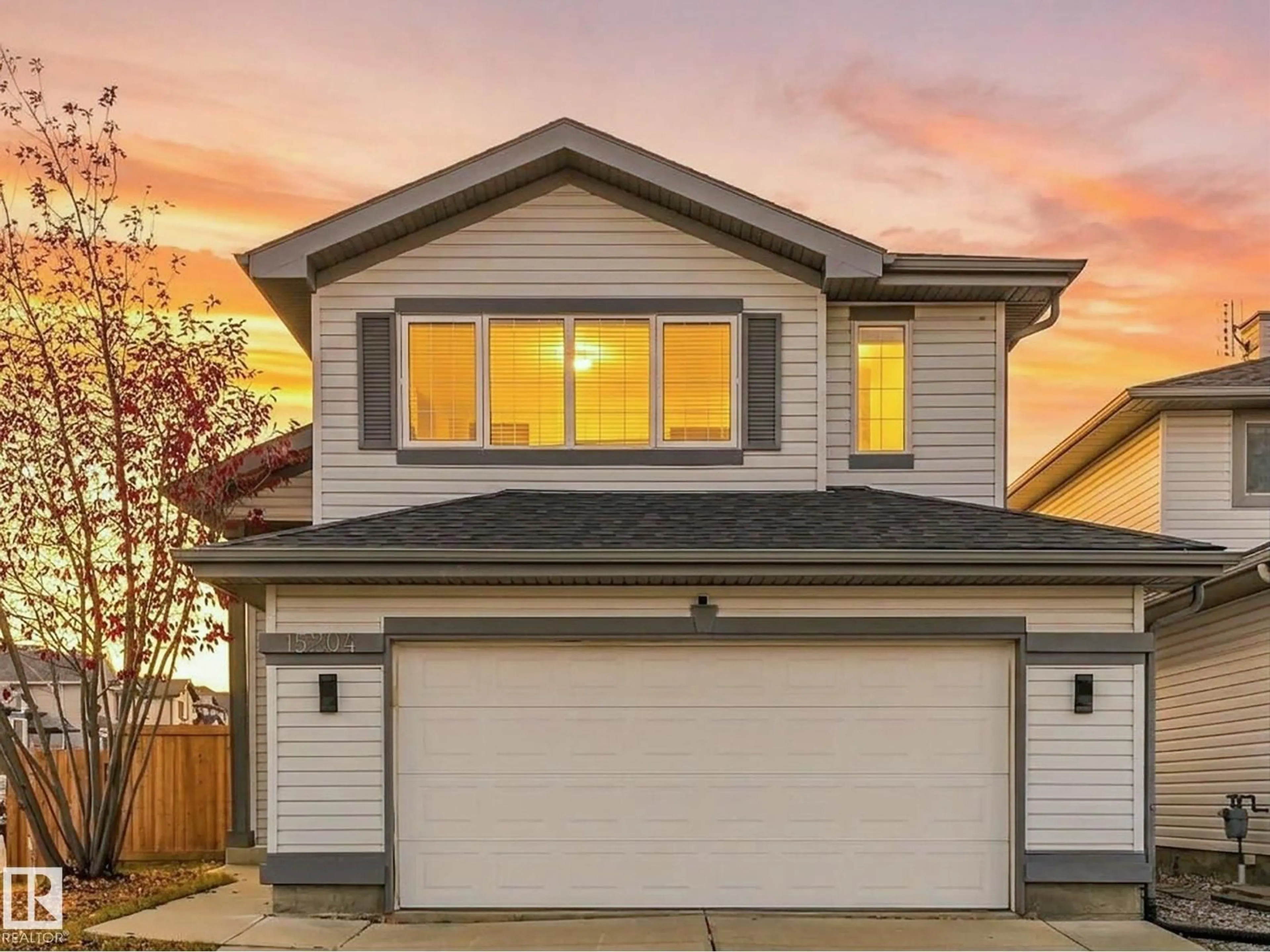 Home with vinyl exterior material, street for 15204 44 ST, Edmonton Alberta T5Y3C4