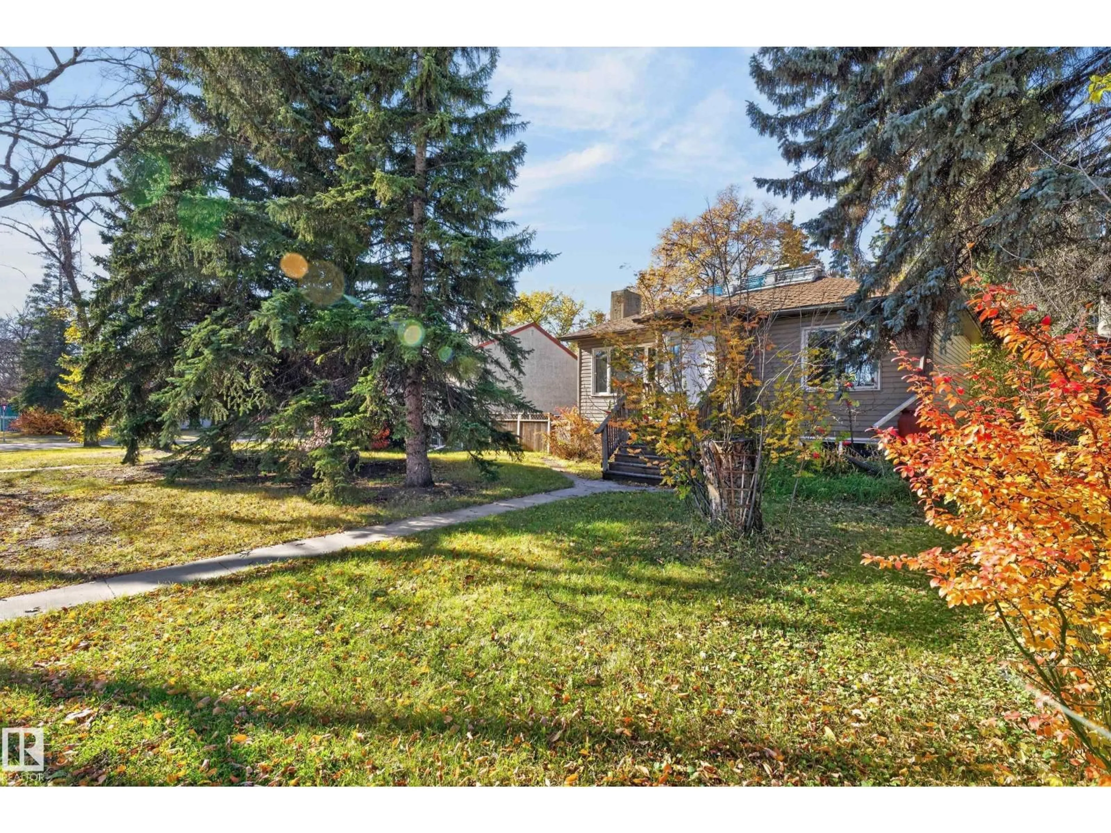 A pic from outside/outdoor area/front of a property/back of a property/a pic from drone, street for 12006 104 ST, Edmonton Alberta T5G2L4