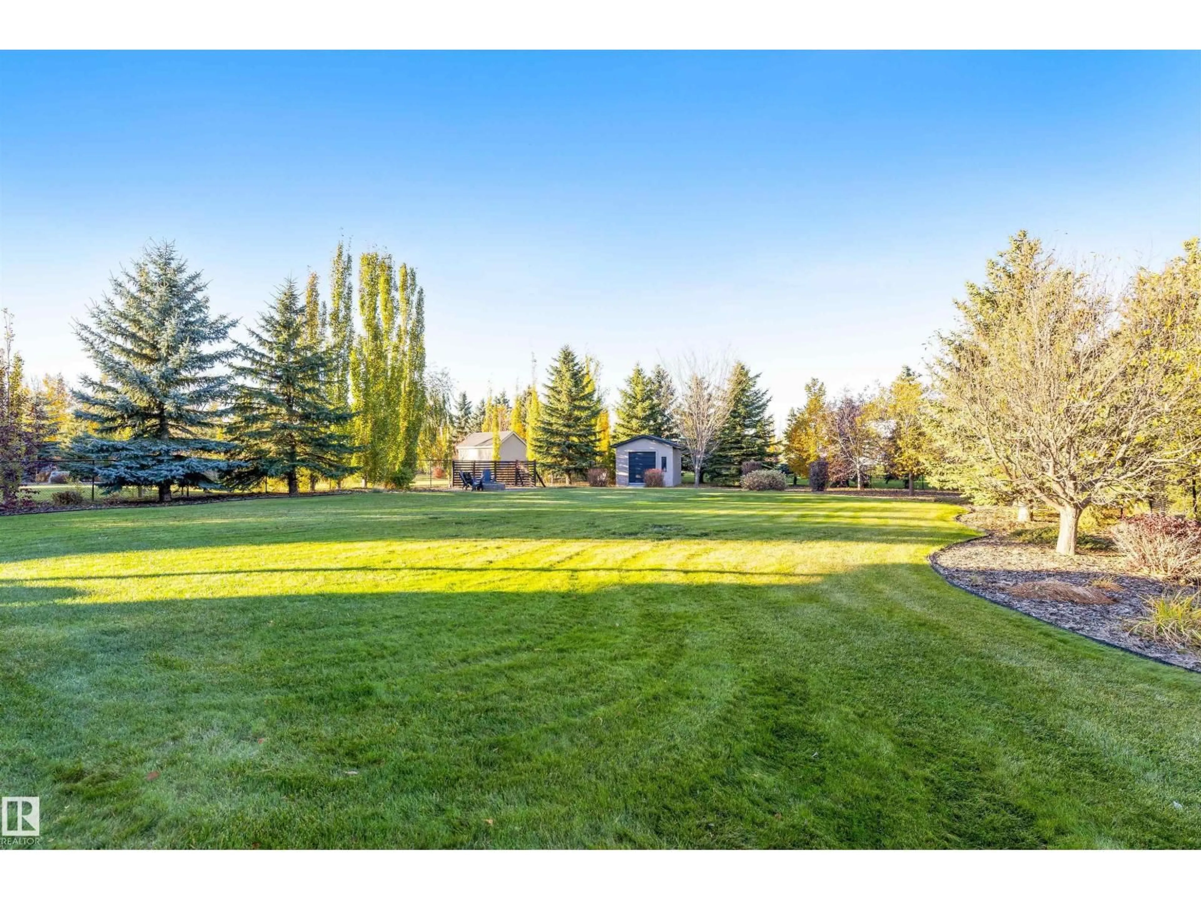 A pic from outside/outdoor area/front of a property/back of a property/a pic from drone, water/lake/river/ocean view for 54418 - 232 RGE ROAD 251, Rural Sturgeon County Alberta T8T0C7