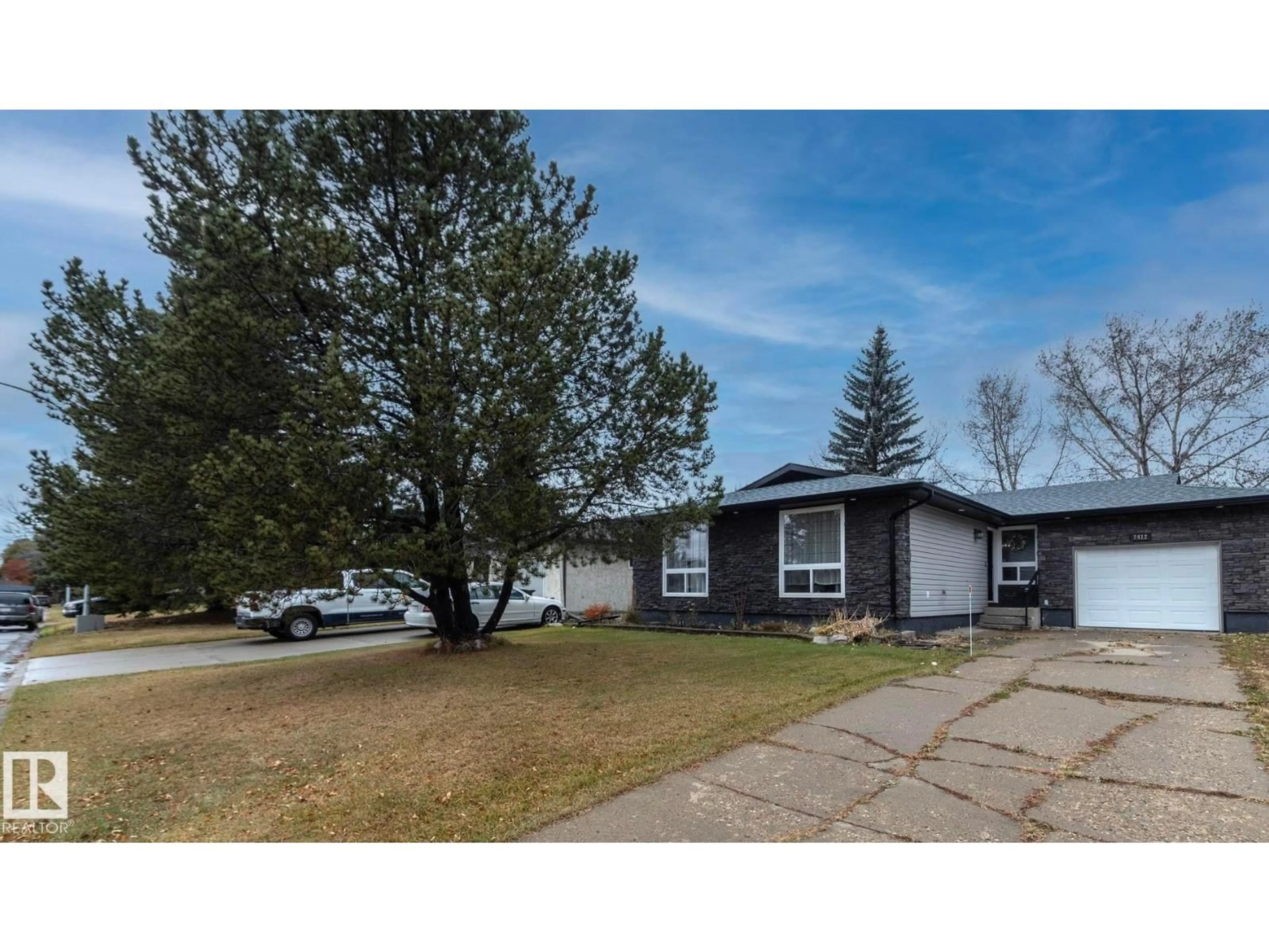 A pic from outside/outdoor area/front of a property/back of a property/a pic from drone, street for 7412 33 AV, Edmonton Alberta T6K1J4