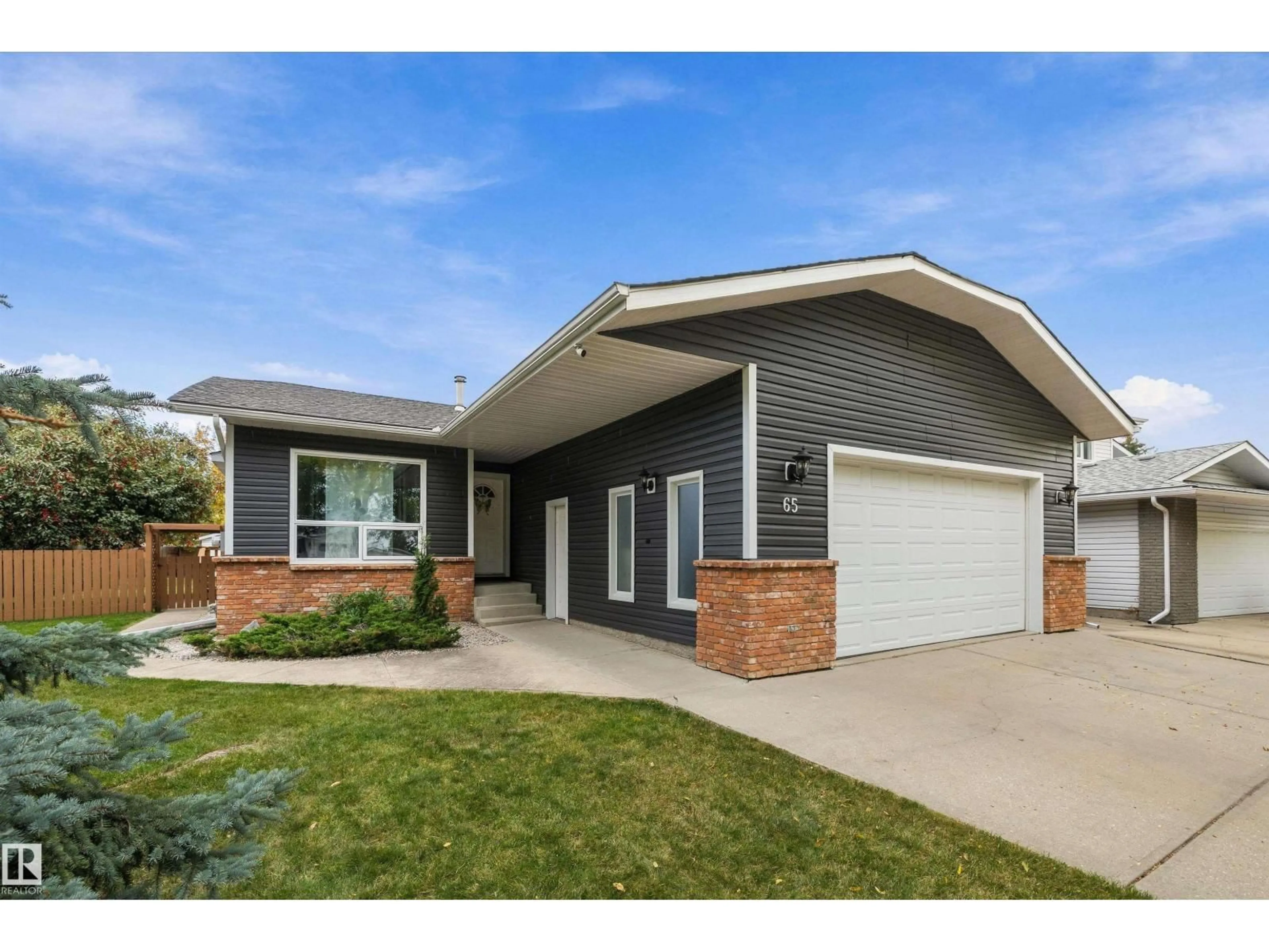 Home with brick exterior material, street for 65 WESTPARK WY, Fort Saskatchewan Alberta T8L3X1