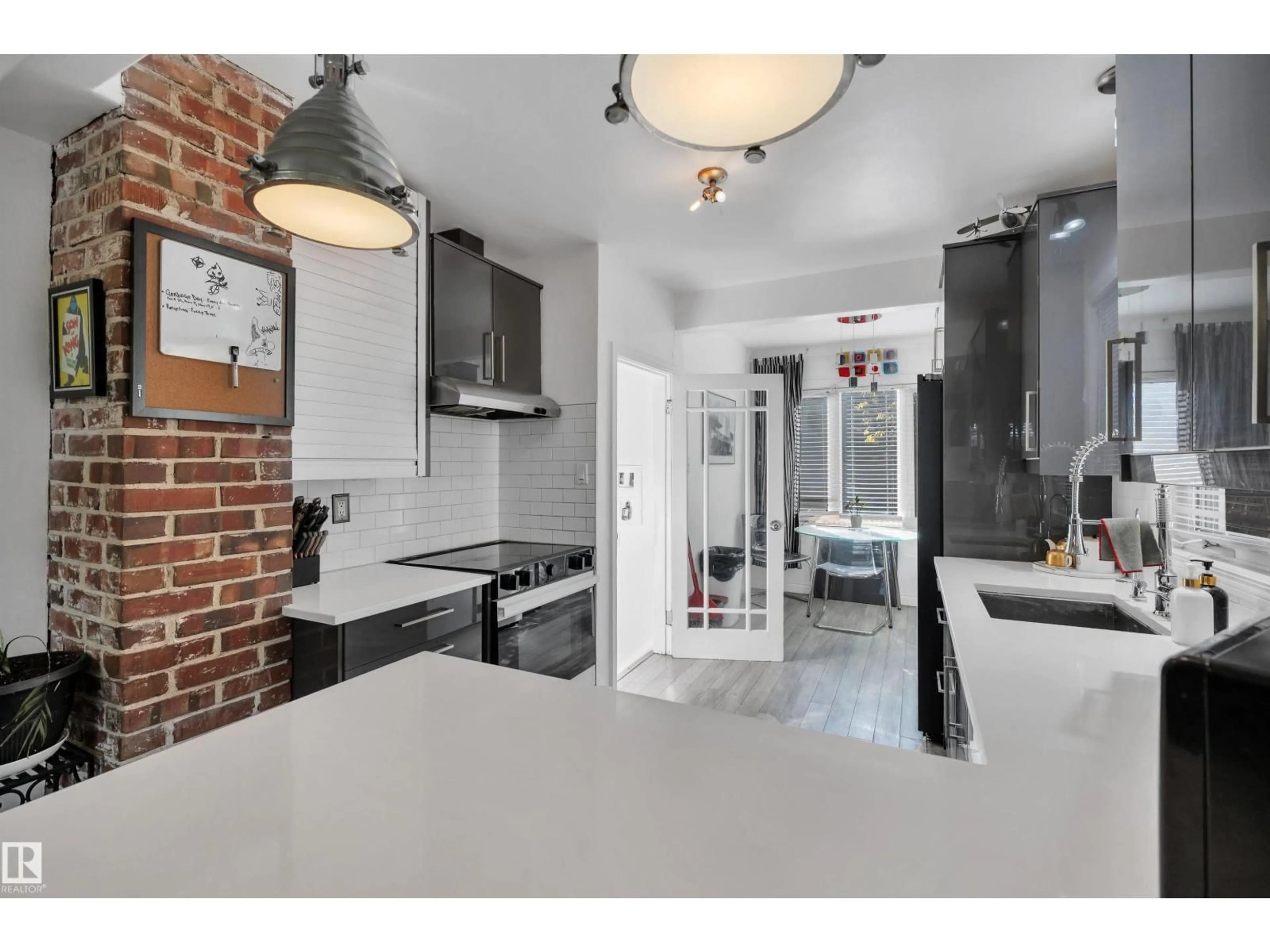 Open concept kitchen, ceramic/tile floor for NW - 9831 83 AV, Edmonton Alberta T6E2B8