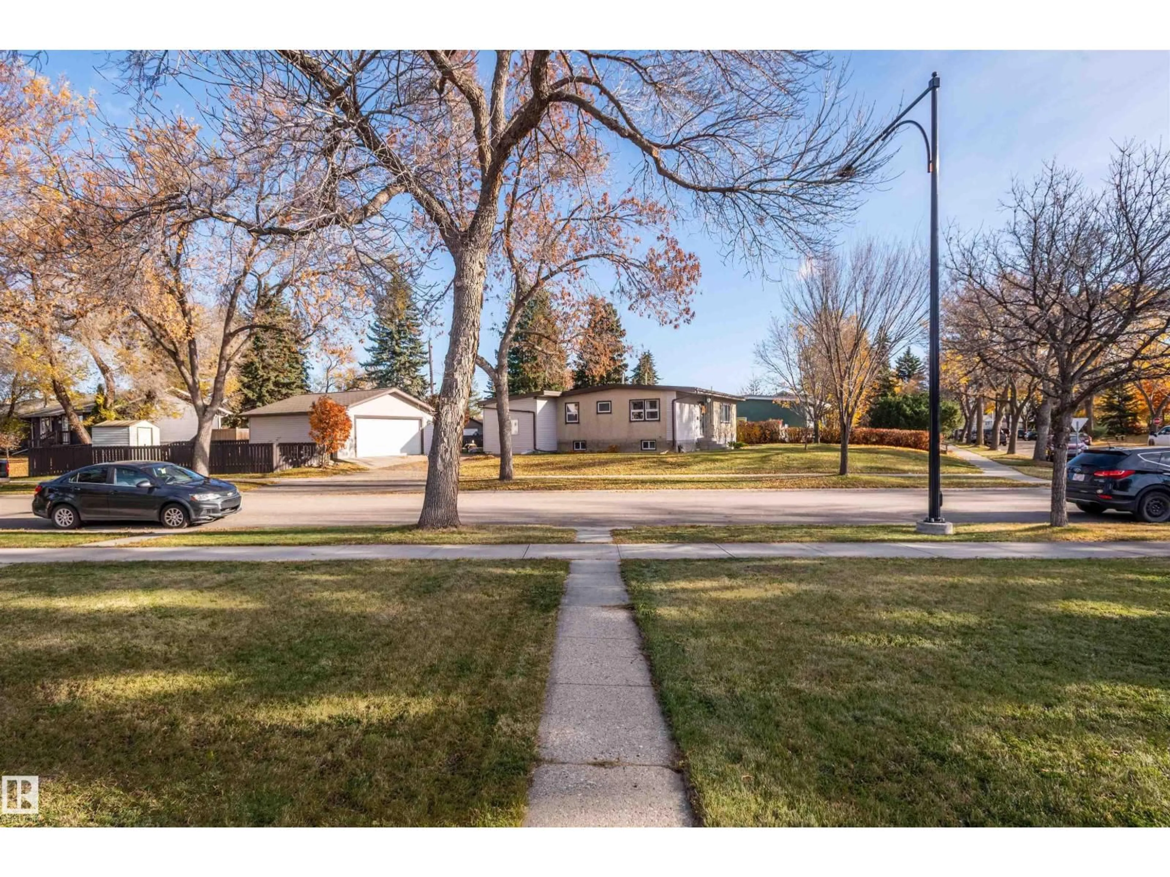 A pic from outside/outdoor area/front of a property/back of a property/a pic from drone, street for NW - 12412 134 ST, Edmonton Alberta T5L1V2